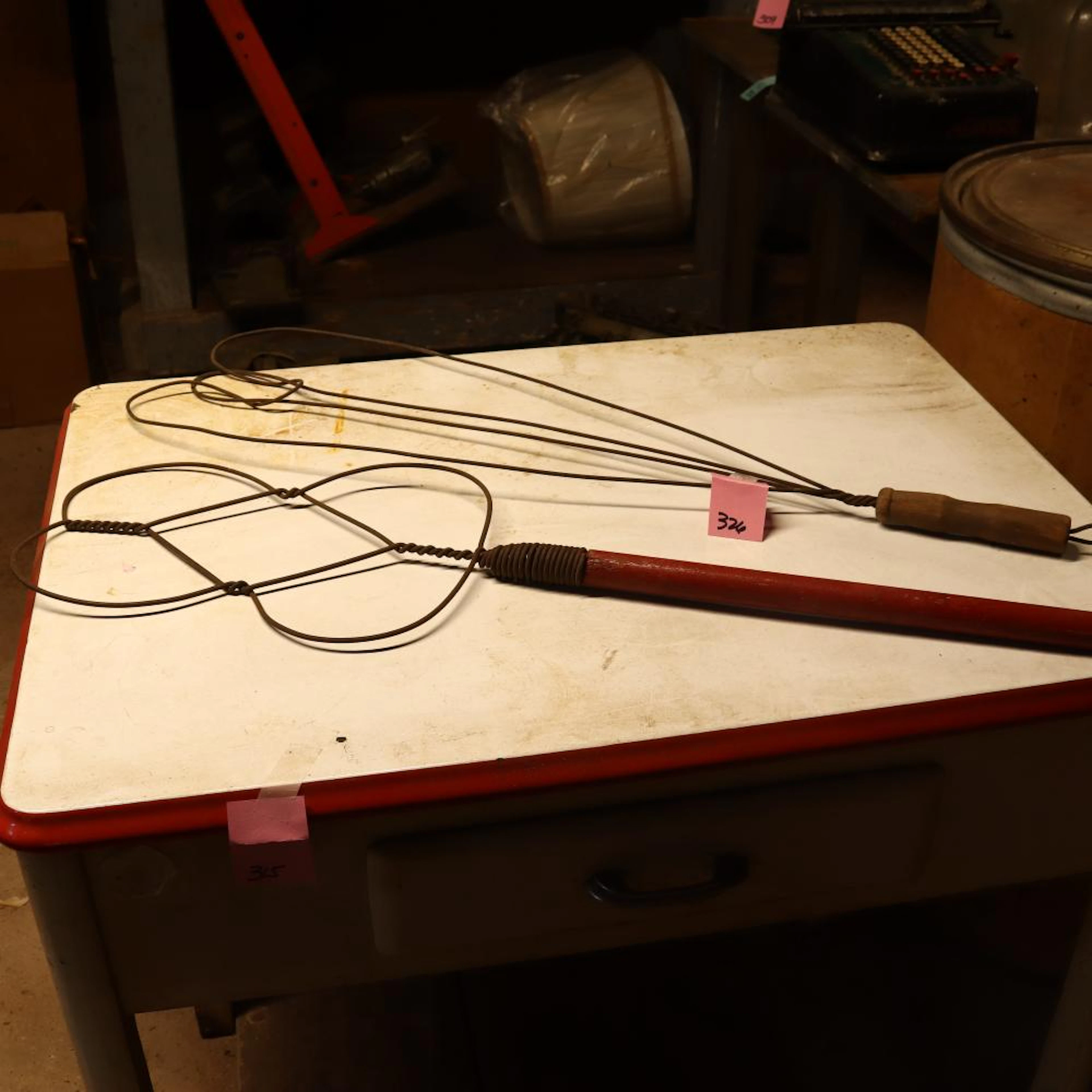 Two antique rug beater
