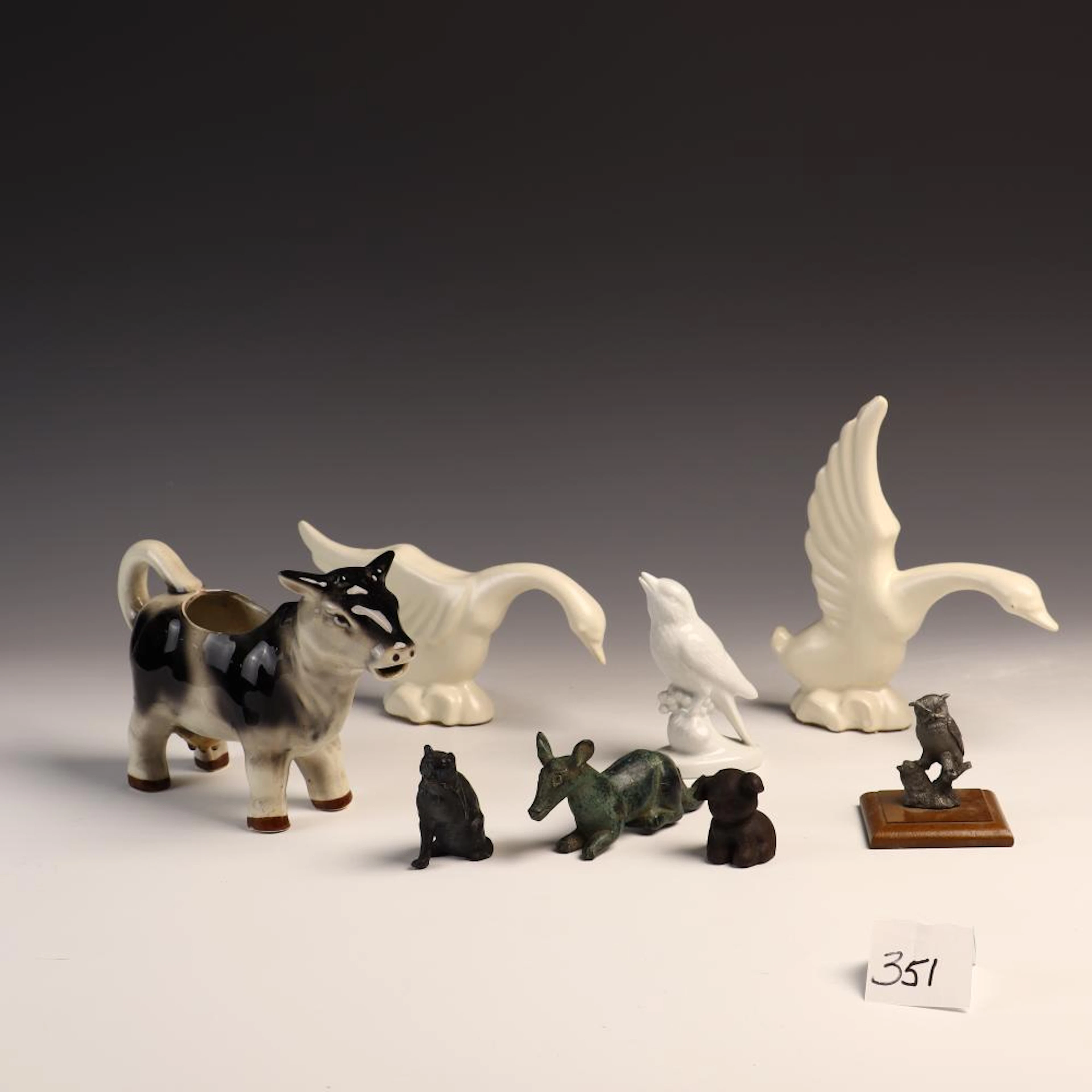 Lot of ceramic and metal animals including a pair of midcentury ceramic geese
