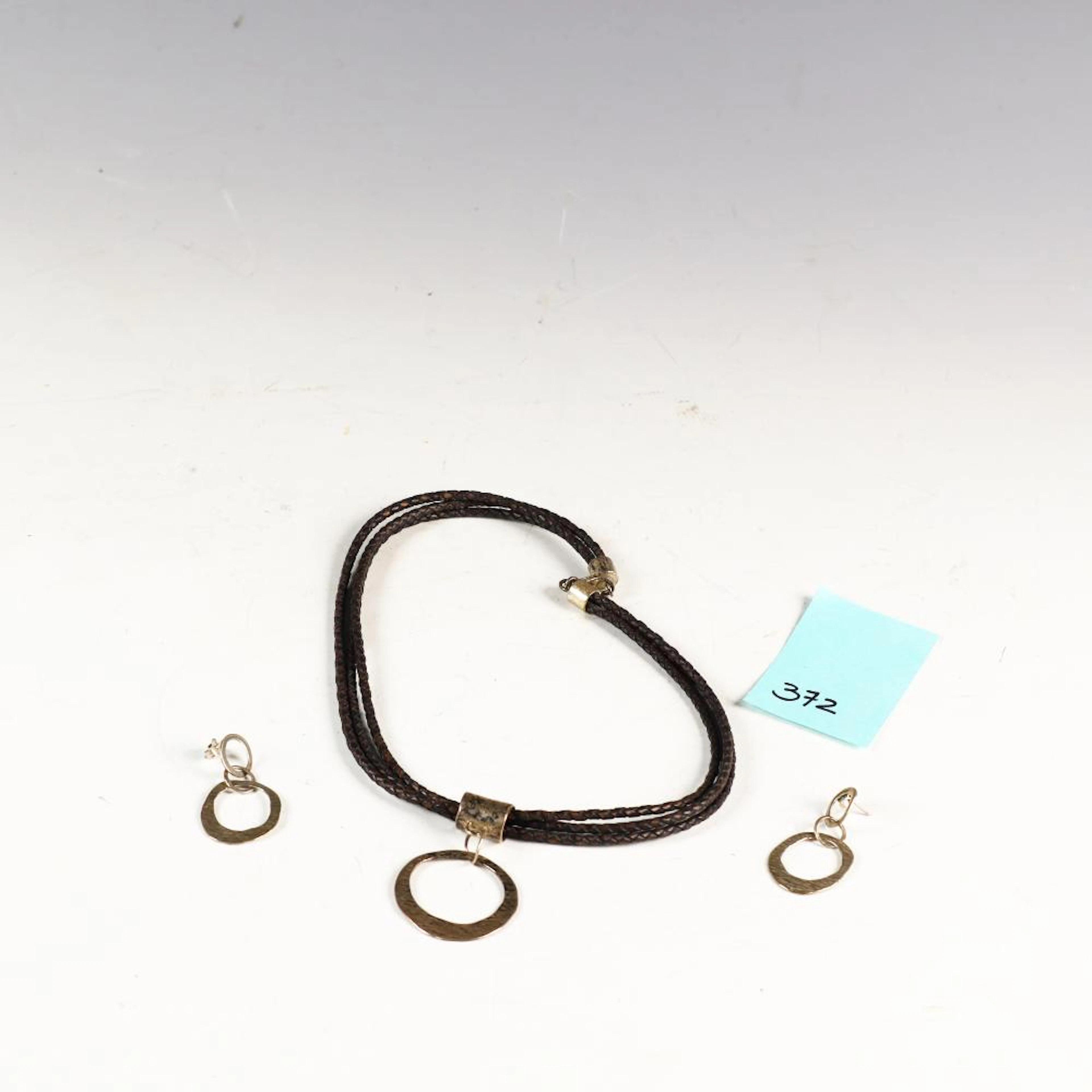 Silpada sterling silver and braided leather necklace and a pair of earrings