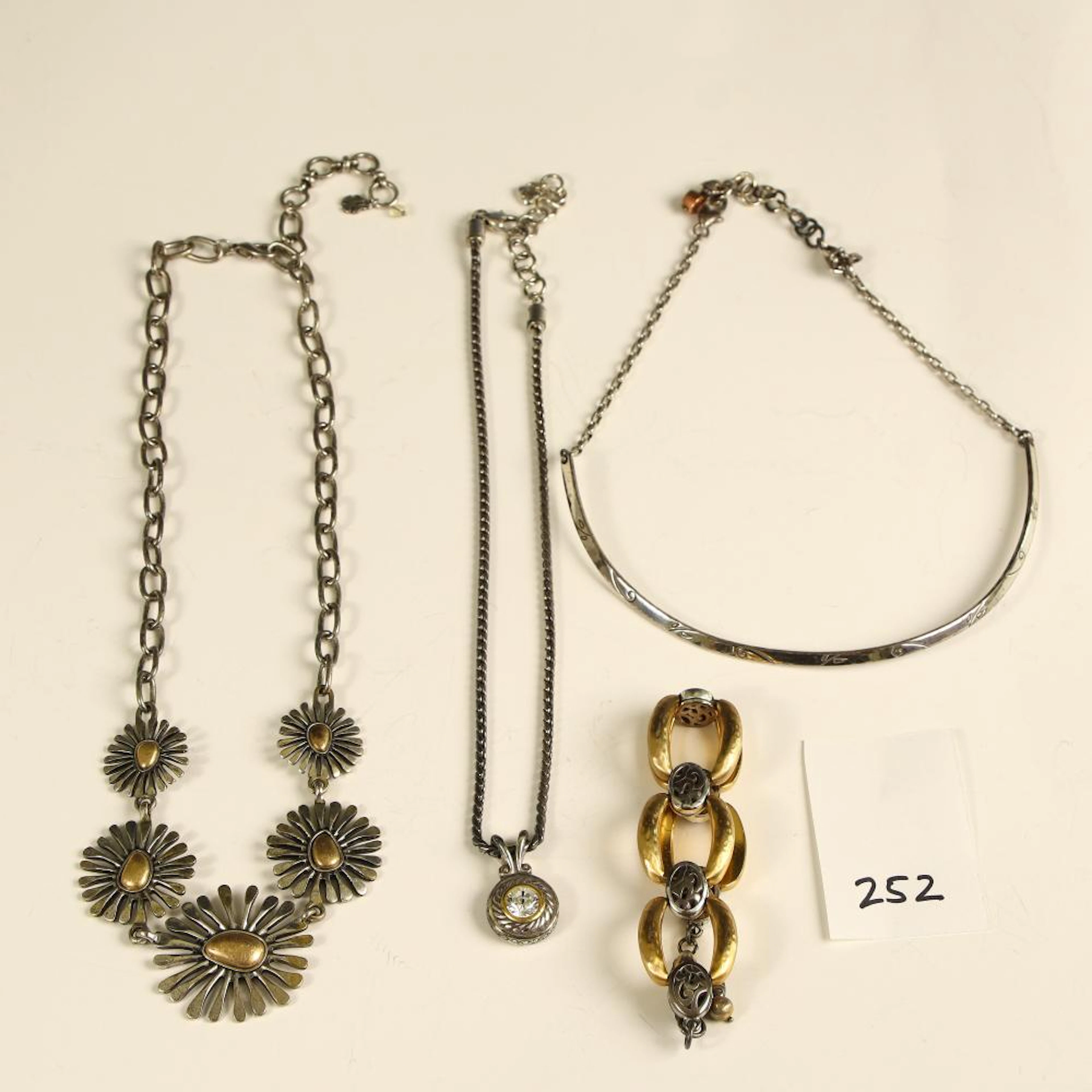 Three Brighton necklaces and another necklace