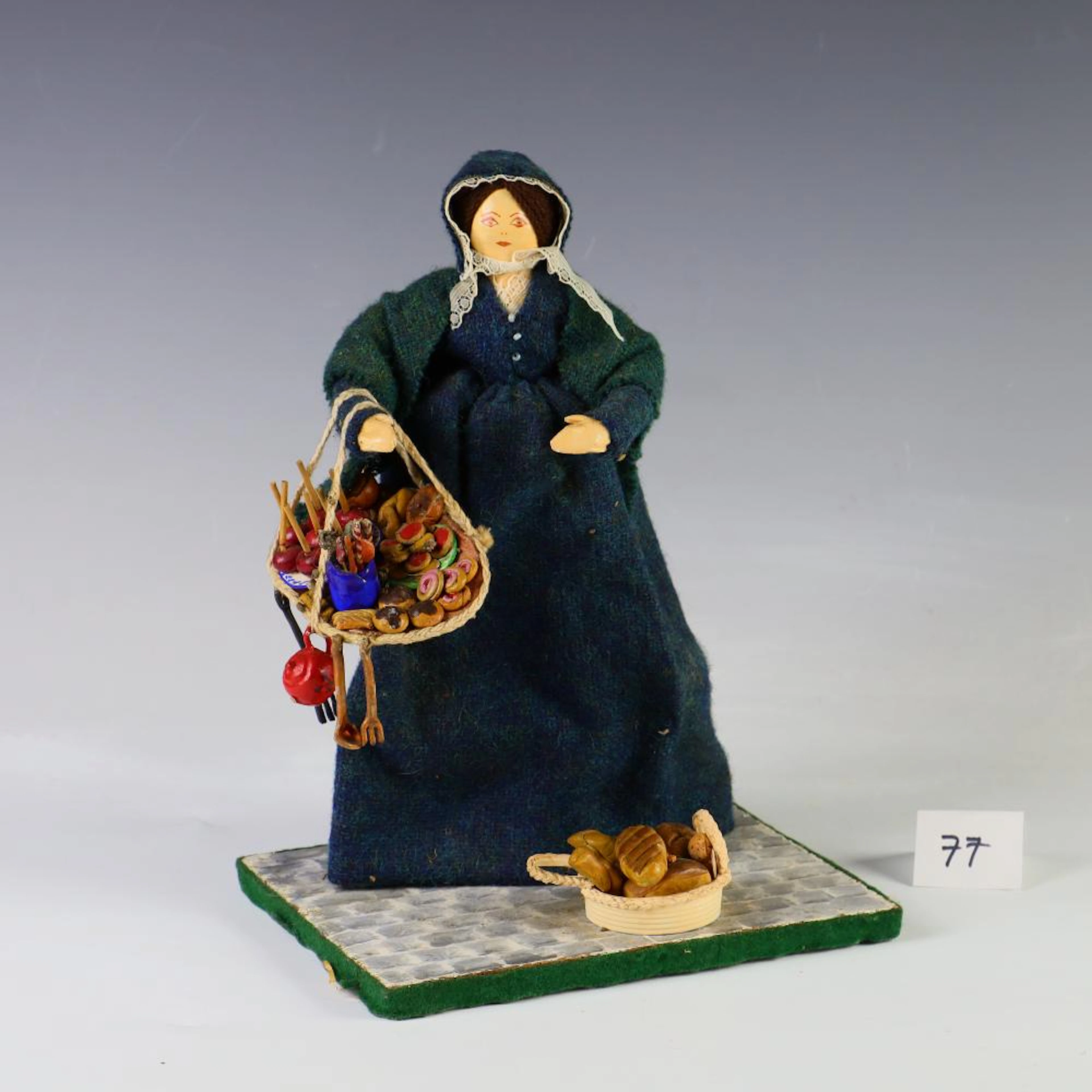 Antique handmade pastry and bread vendor wool clothed doll