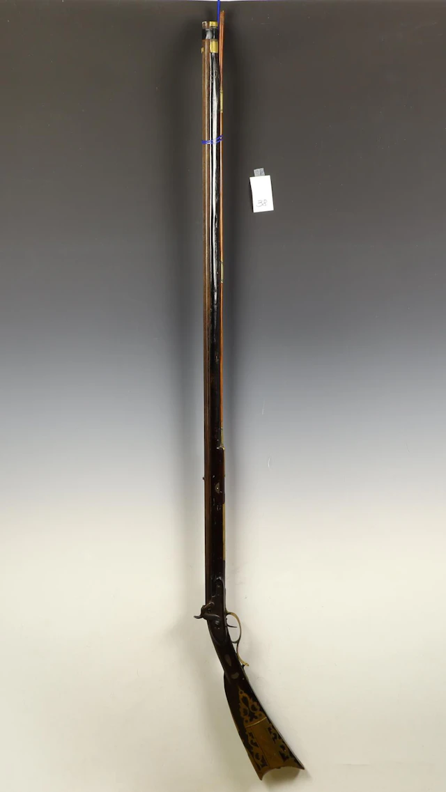 Antique Pennsylvania musket inlaid in brass and silver