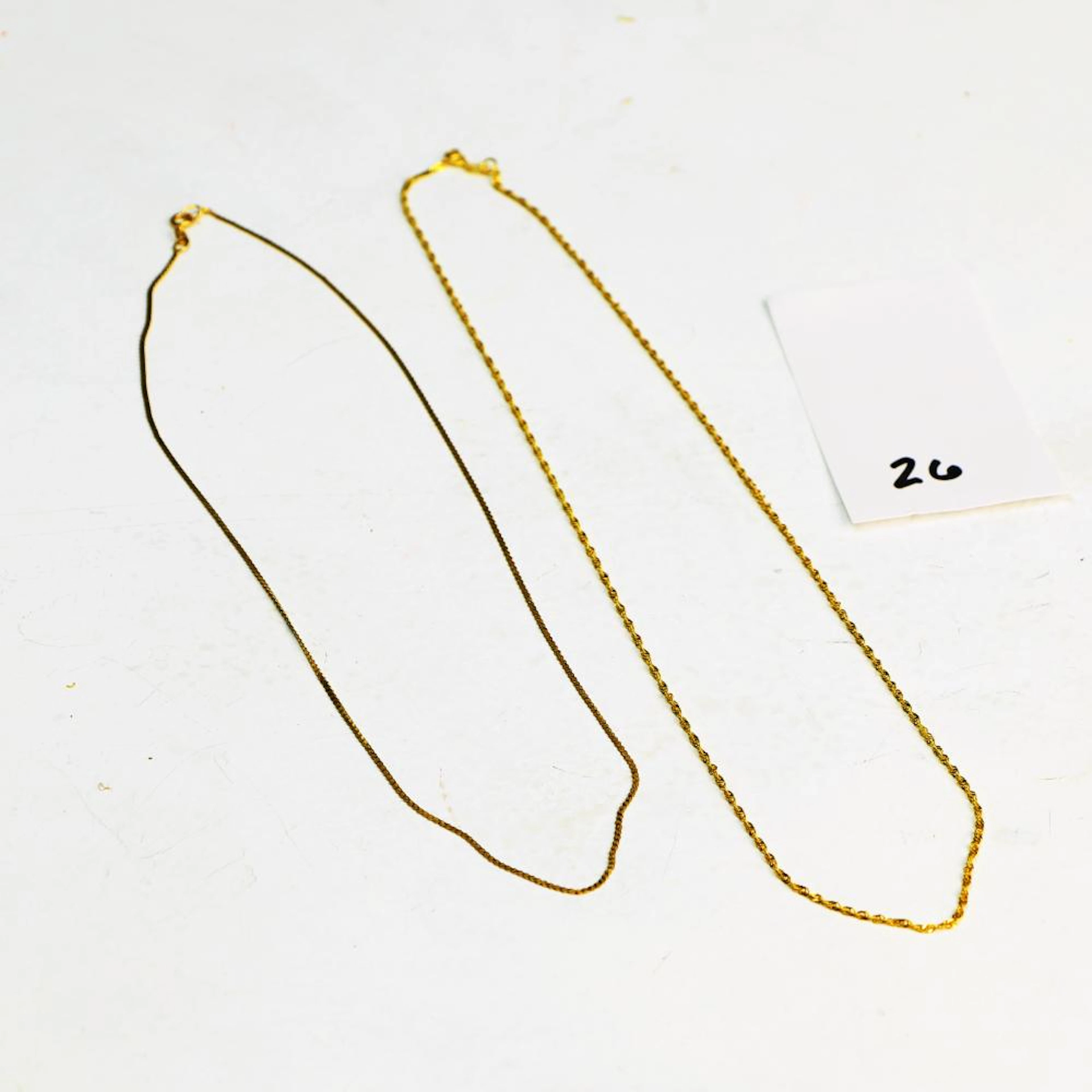 Two 14K yellow gold chains