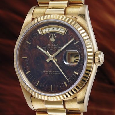 A rare and attractive yellow gold calendar wristwatch with center