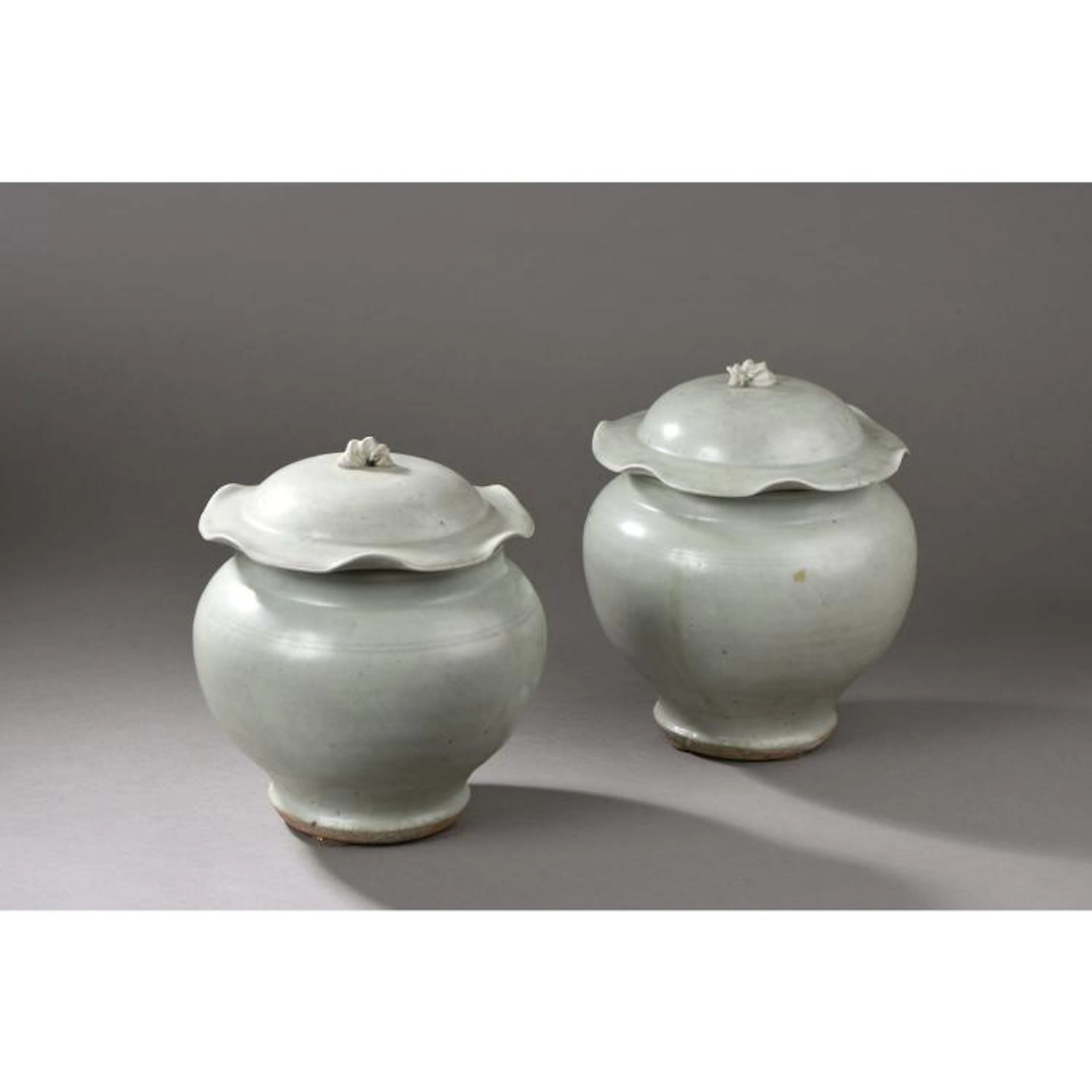 Pair of Chinese Longquan celadon porcelain jars. Possibly Mi