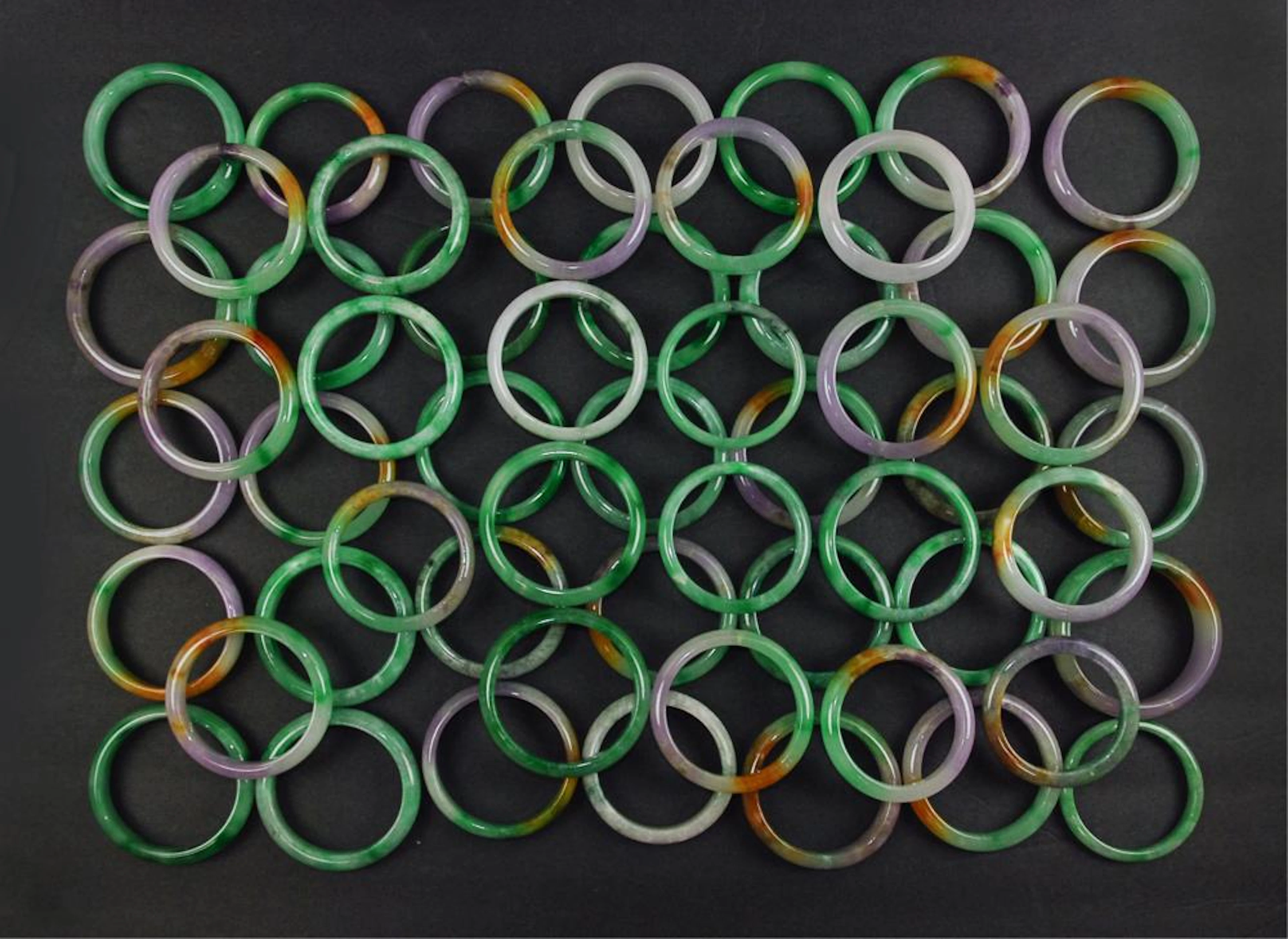 Group Of 56 Pc Jade / Varied Stone Bangles