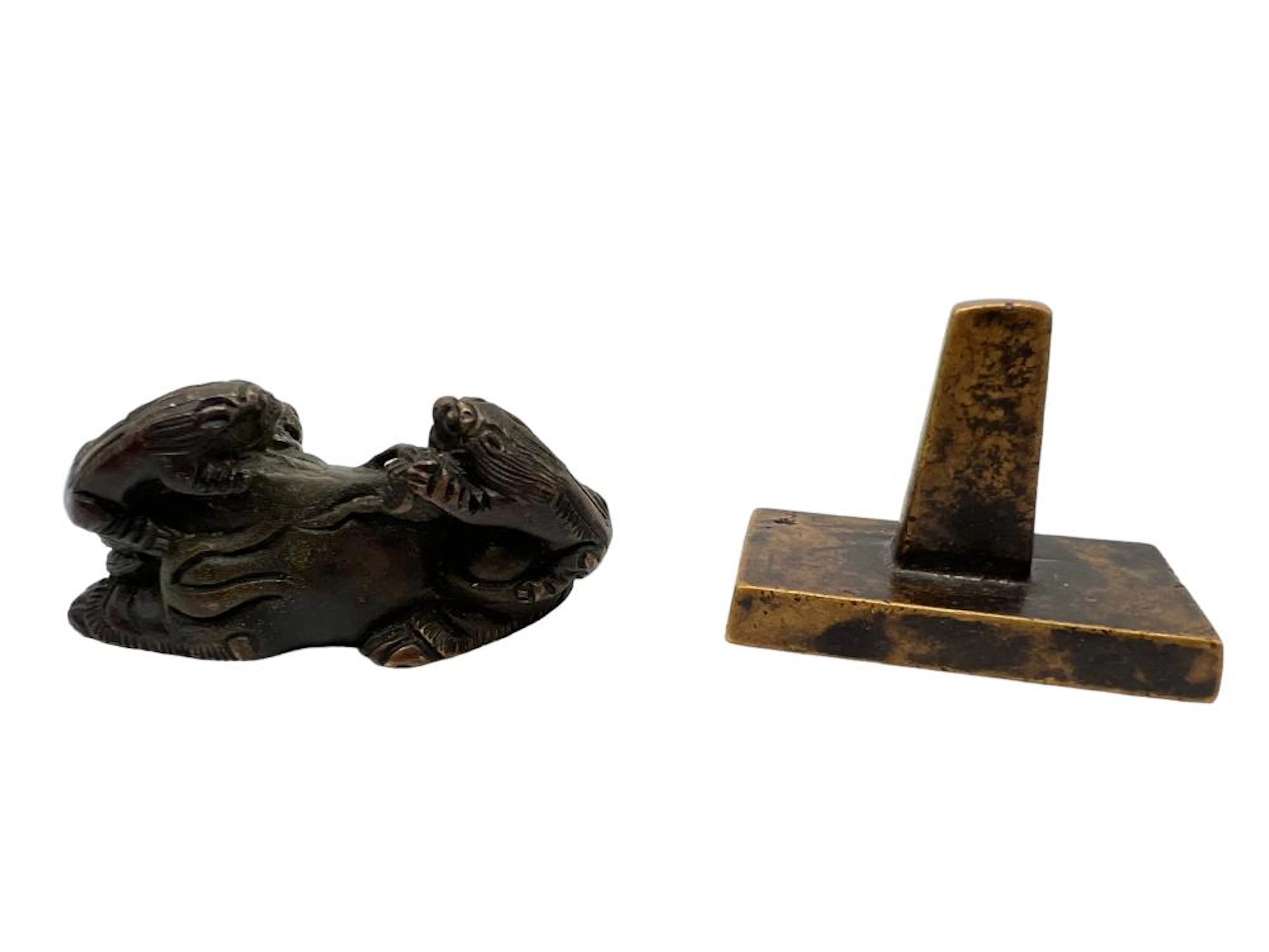 TWO CHINESE BRONZE FOO DOG PAPER WEIGHT AND SEAL