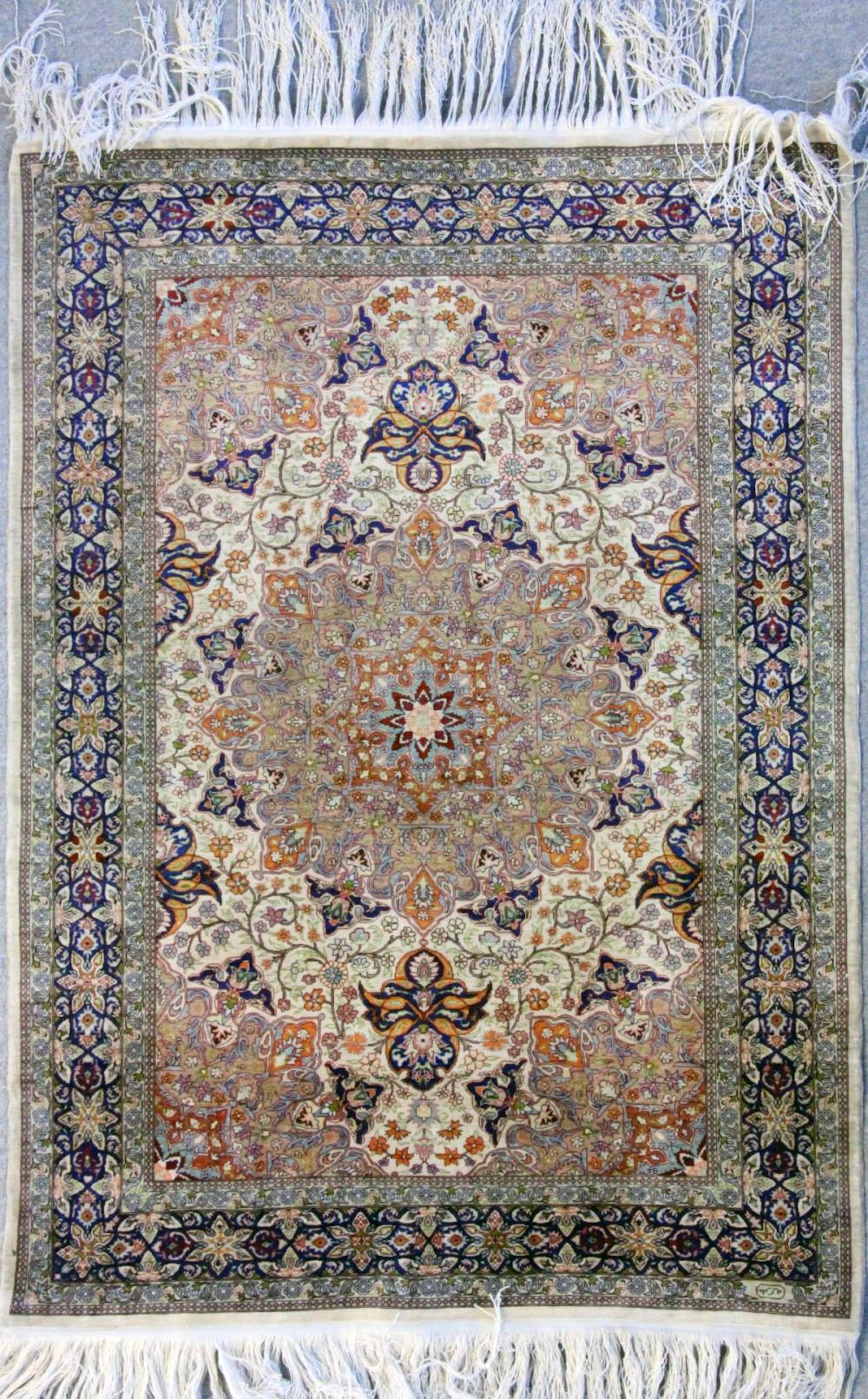 A TURKISH HEREKE SILK RUG with Hereke pattern