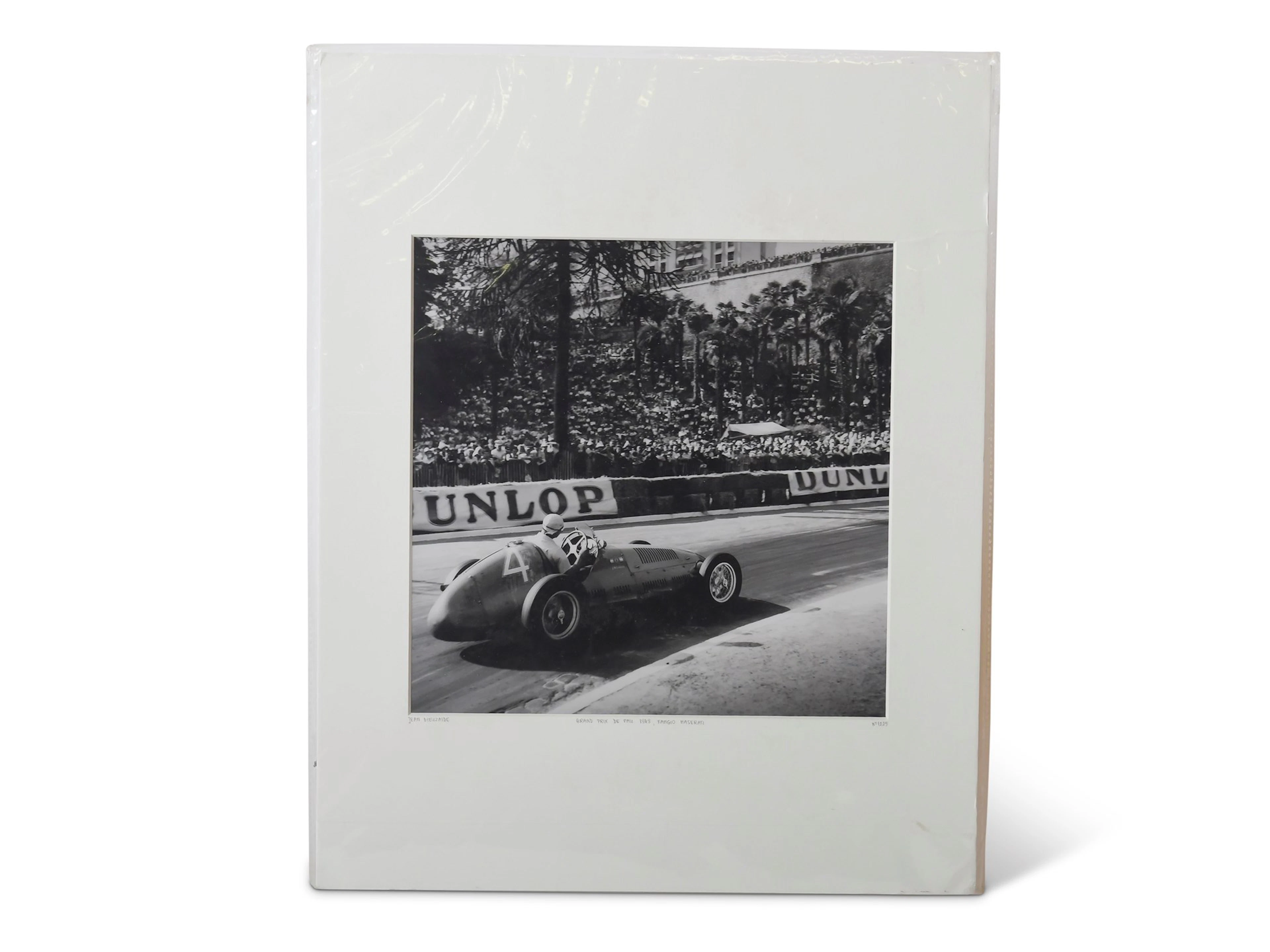 Photograph of Juan Manuel Fangio Racing at the 1949 Grand...