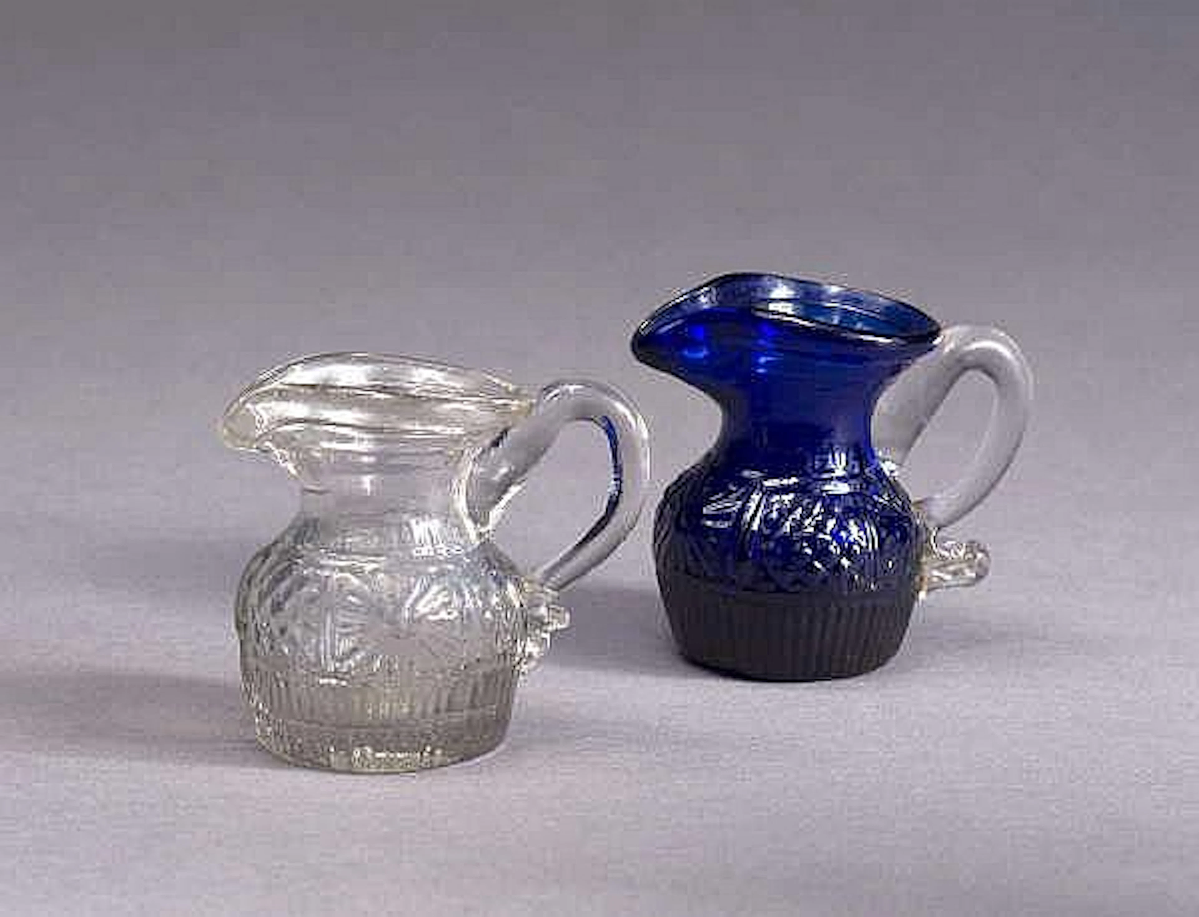 RARE BLOWN THREE-MOLD COBALT-BLUE GLASS 'SUNBURST' PATTERN TOY JUG