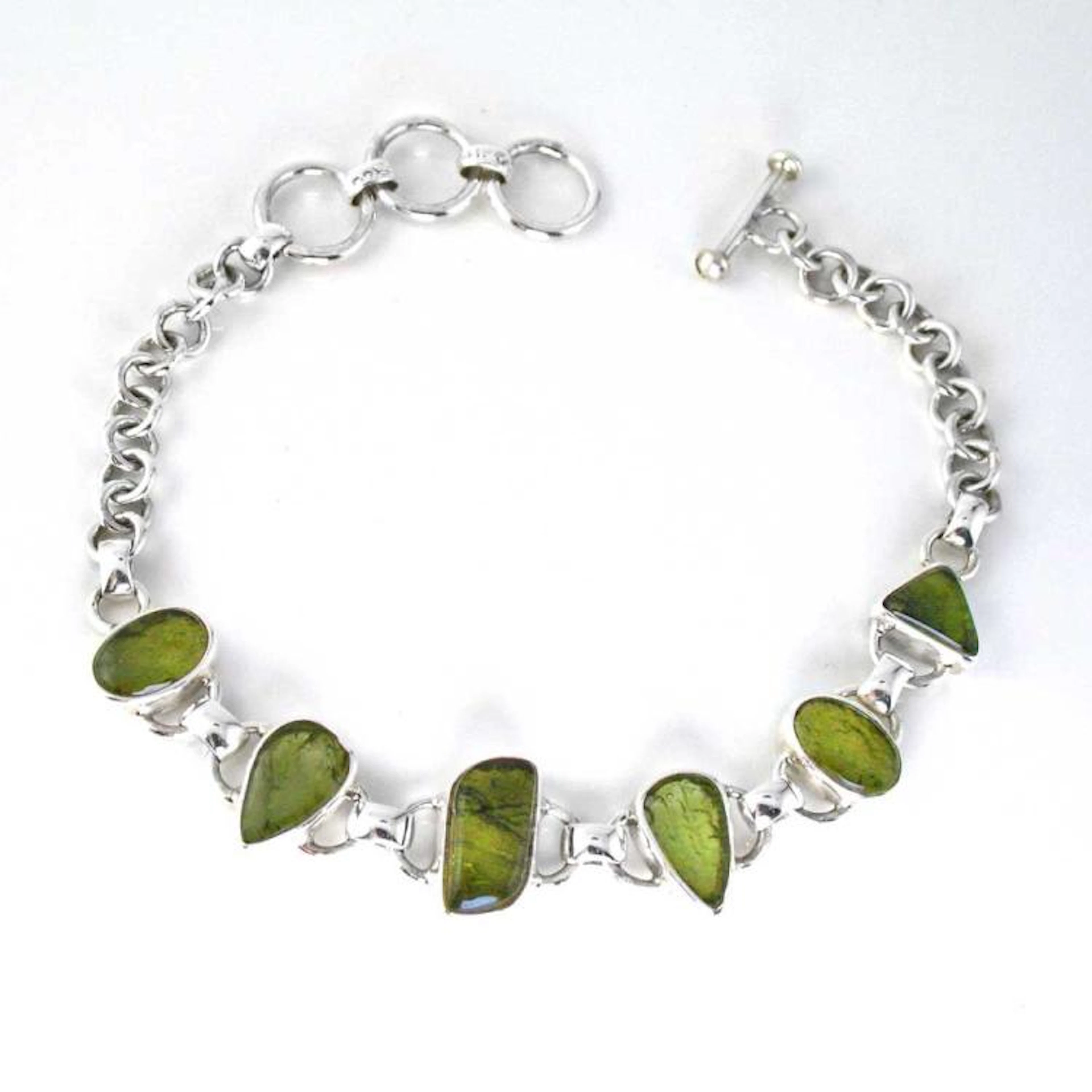 Polished Moldavite in a Silver Bracelet