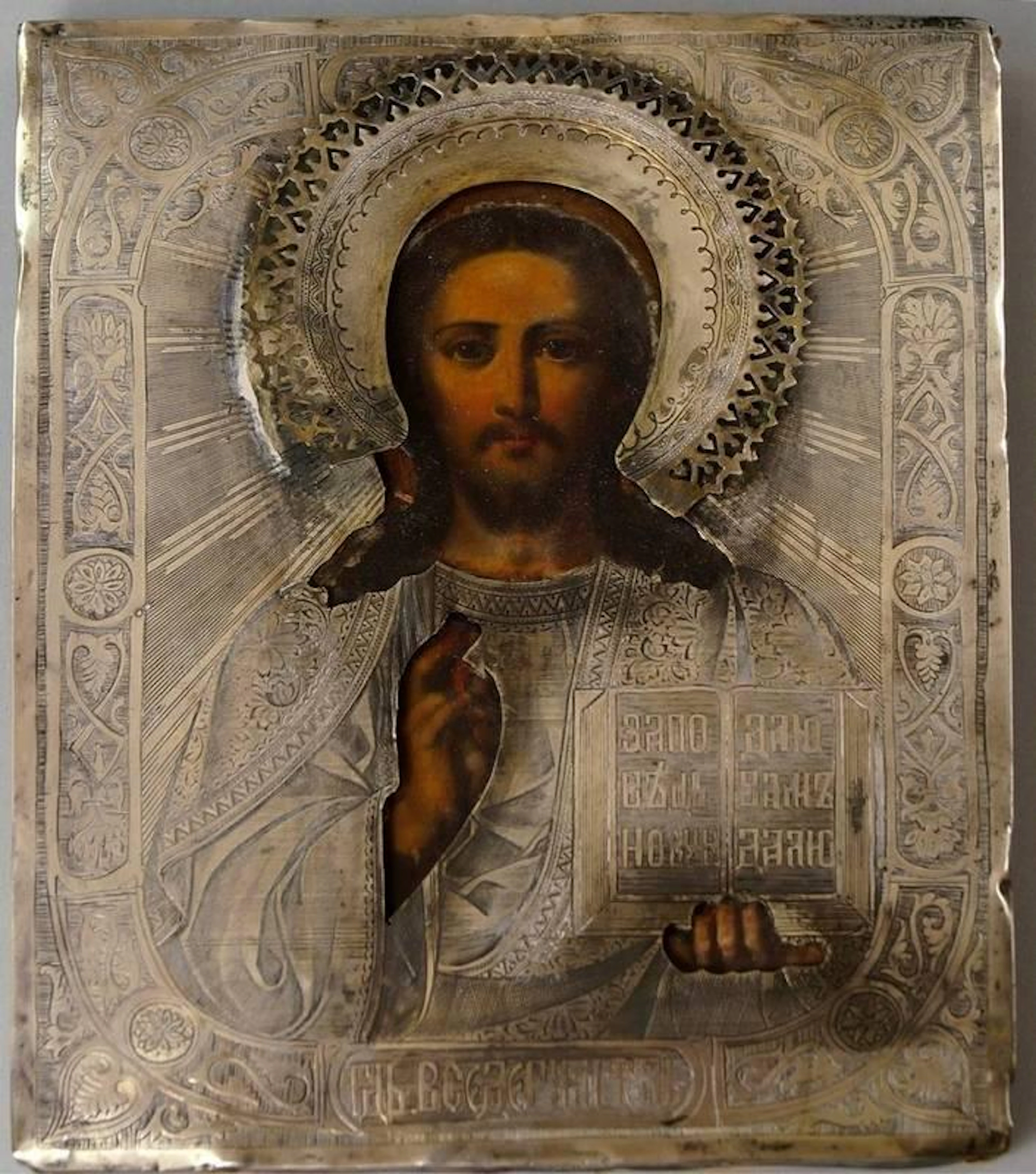 A Russian icon of Christ, early 20th century, with a Jewellery, Silver