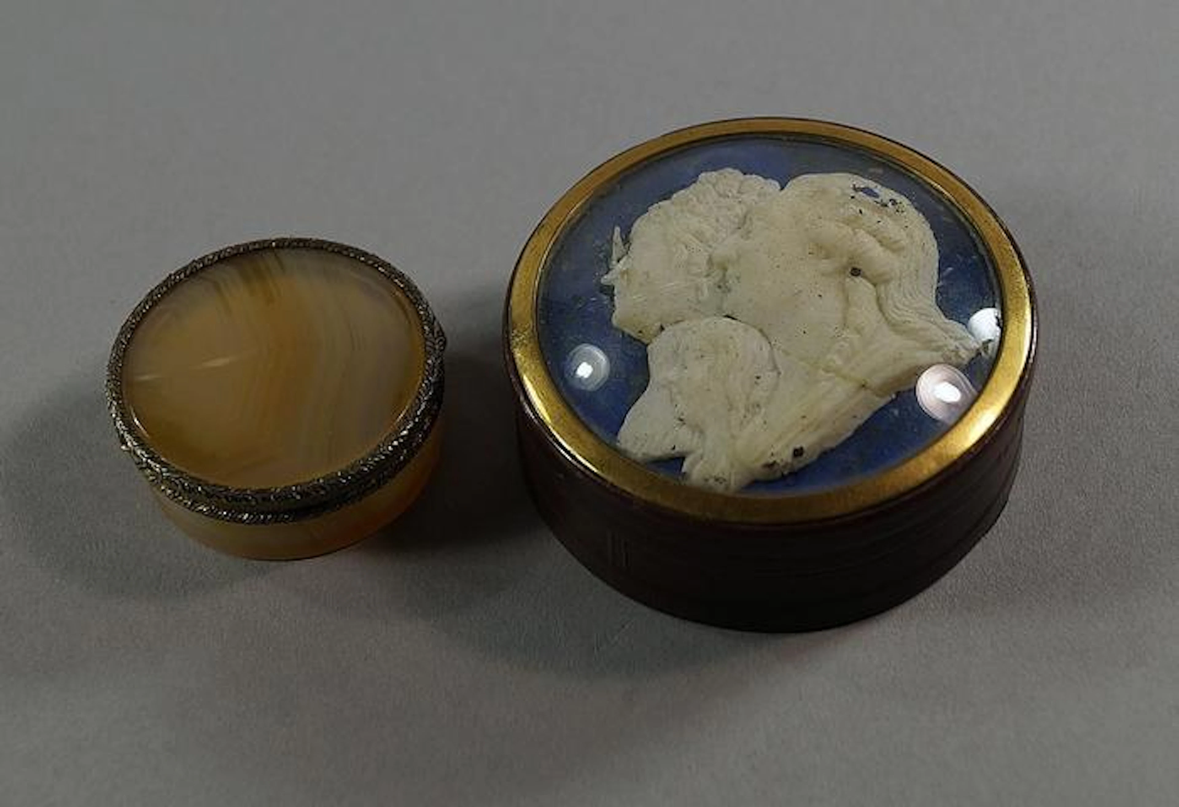 A French circular box, 19th century, the top with a wax portrait group