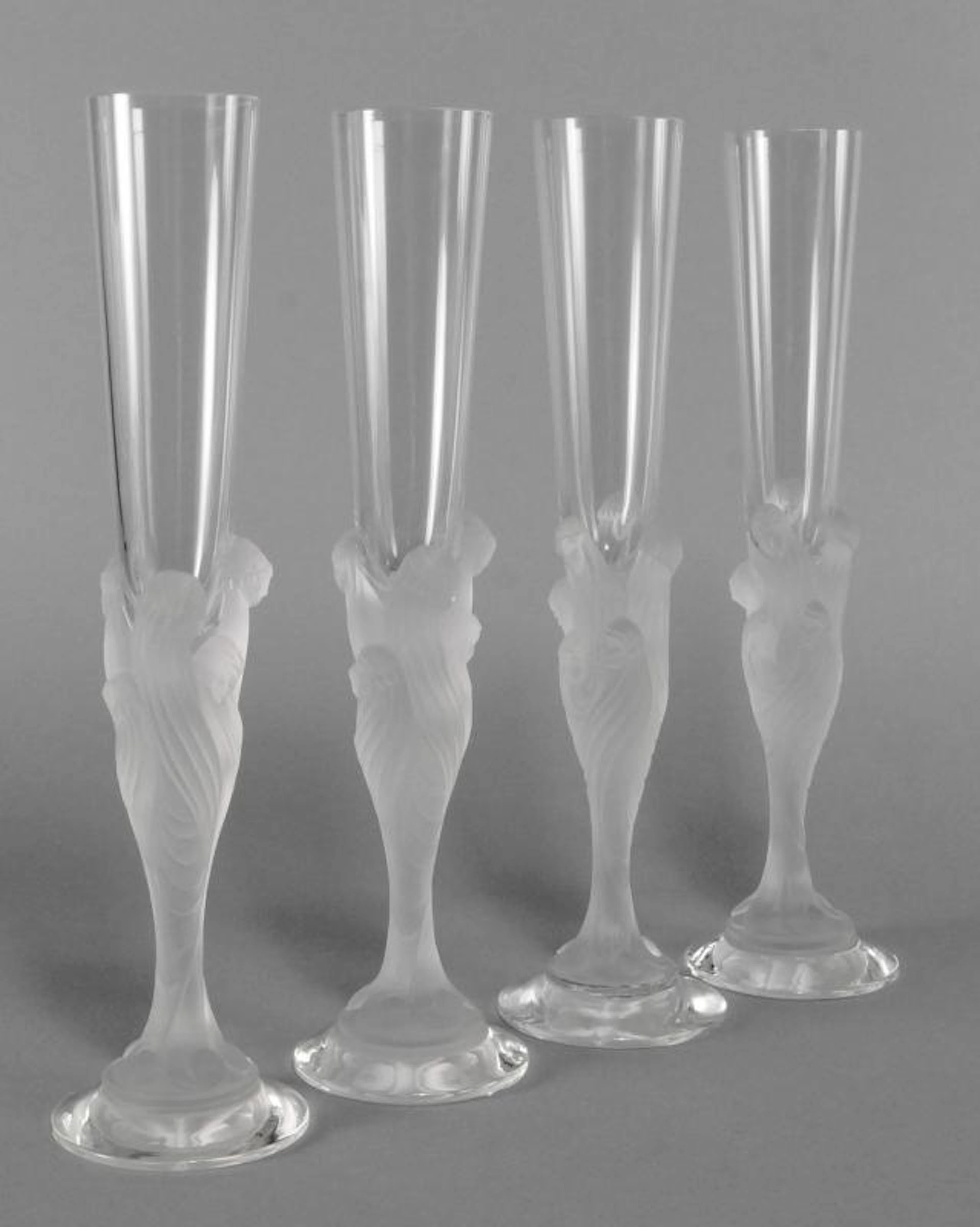 A set of twelve Erté 'Flute Majestique' crystal champagne flutes
