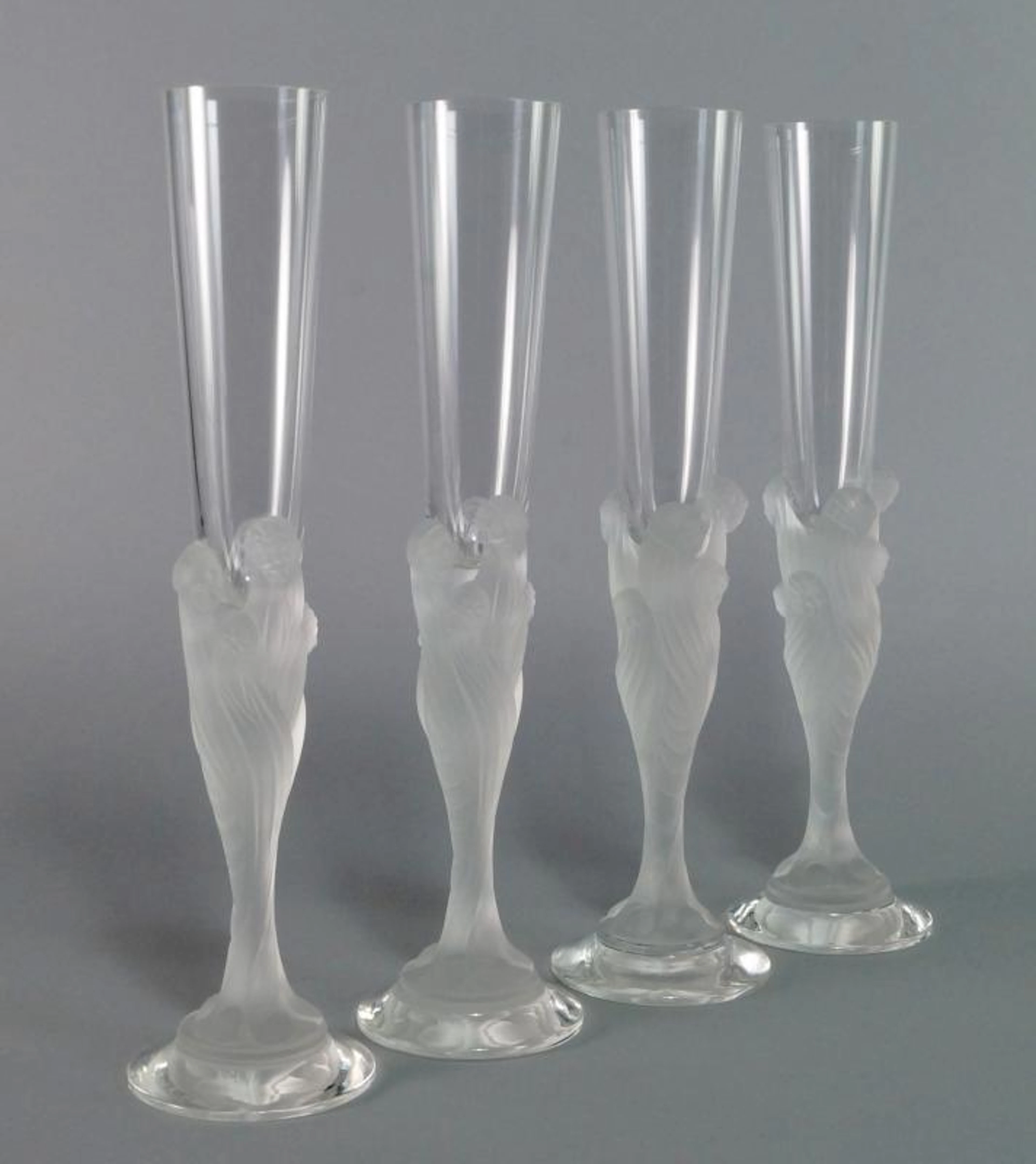 A set of twelve Erté 'Flute Majestique' crystal champagne flutes