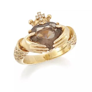 An 18ct gold smoky quartz and diamond Claddagh ring
