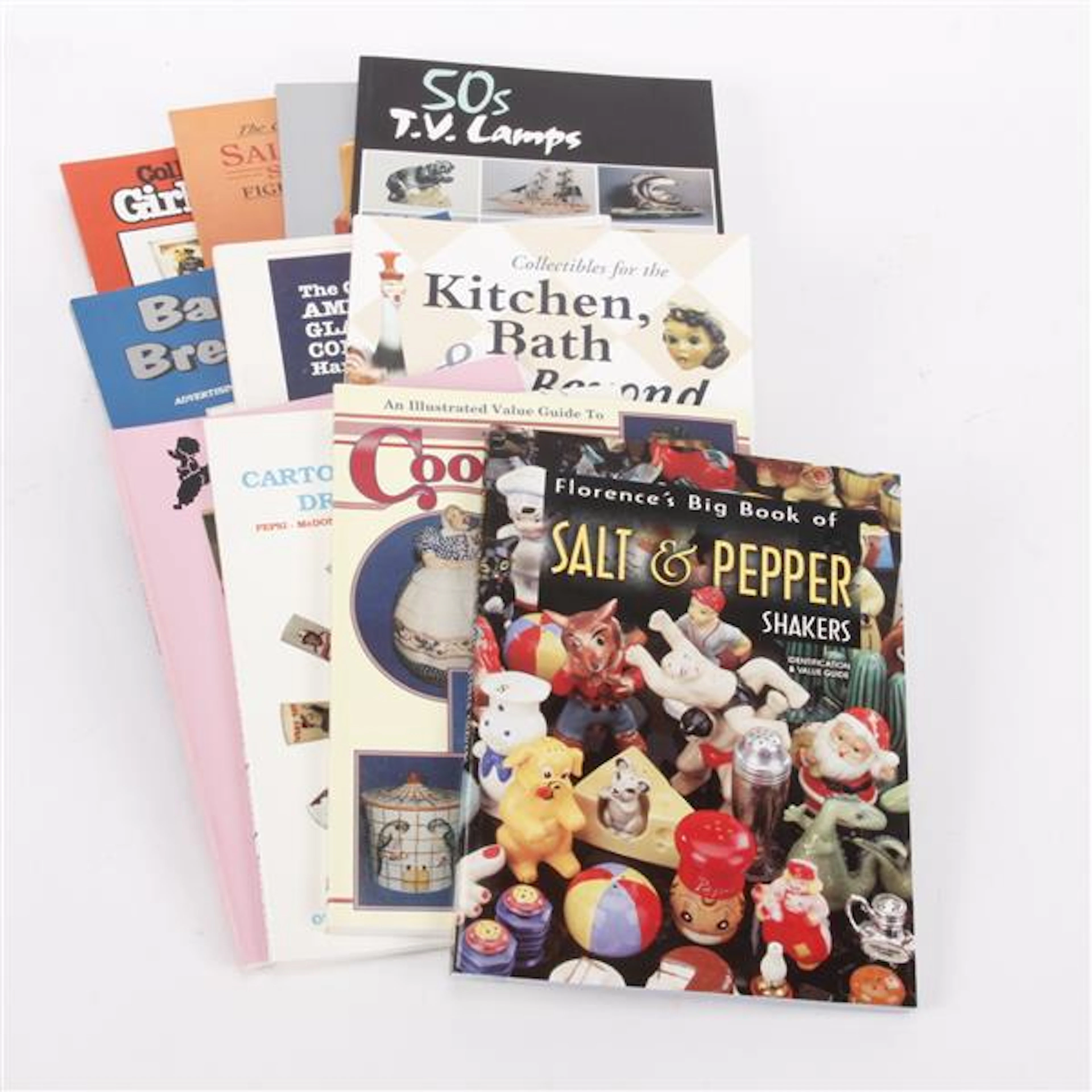 Grouping of twelve collectible reference books / guides.