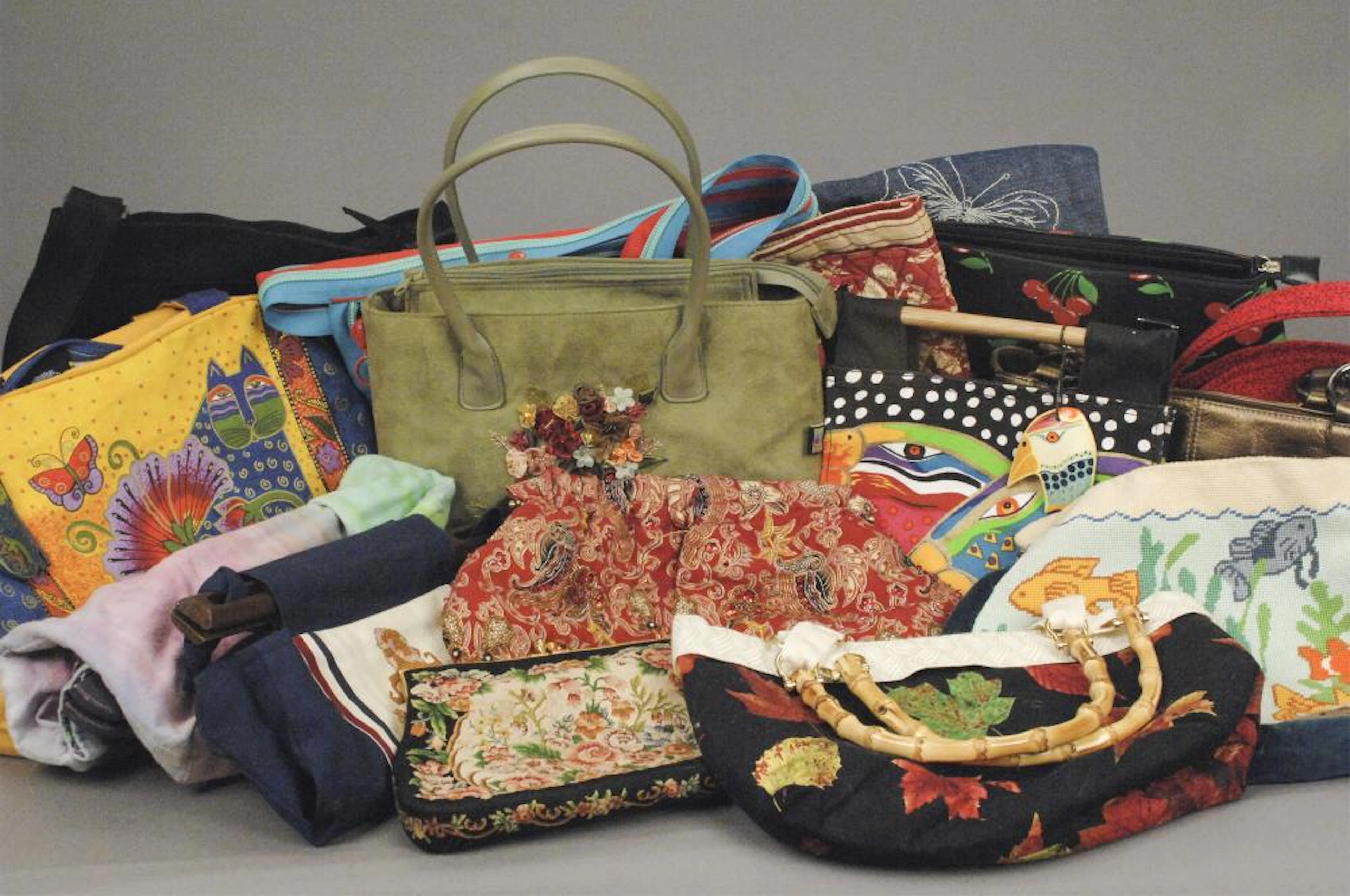 Large Assortment of Colorful Handbags - Purses