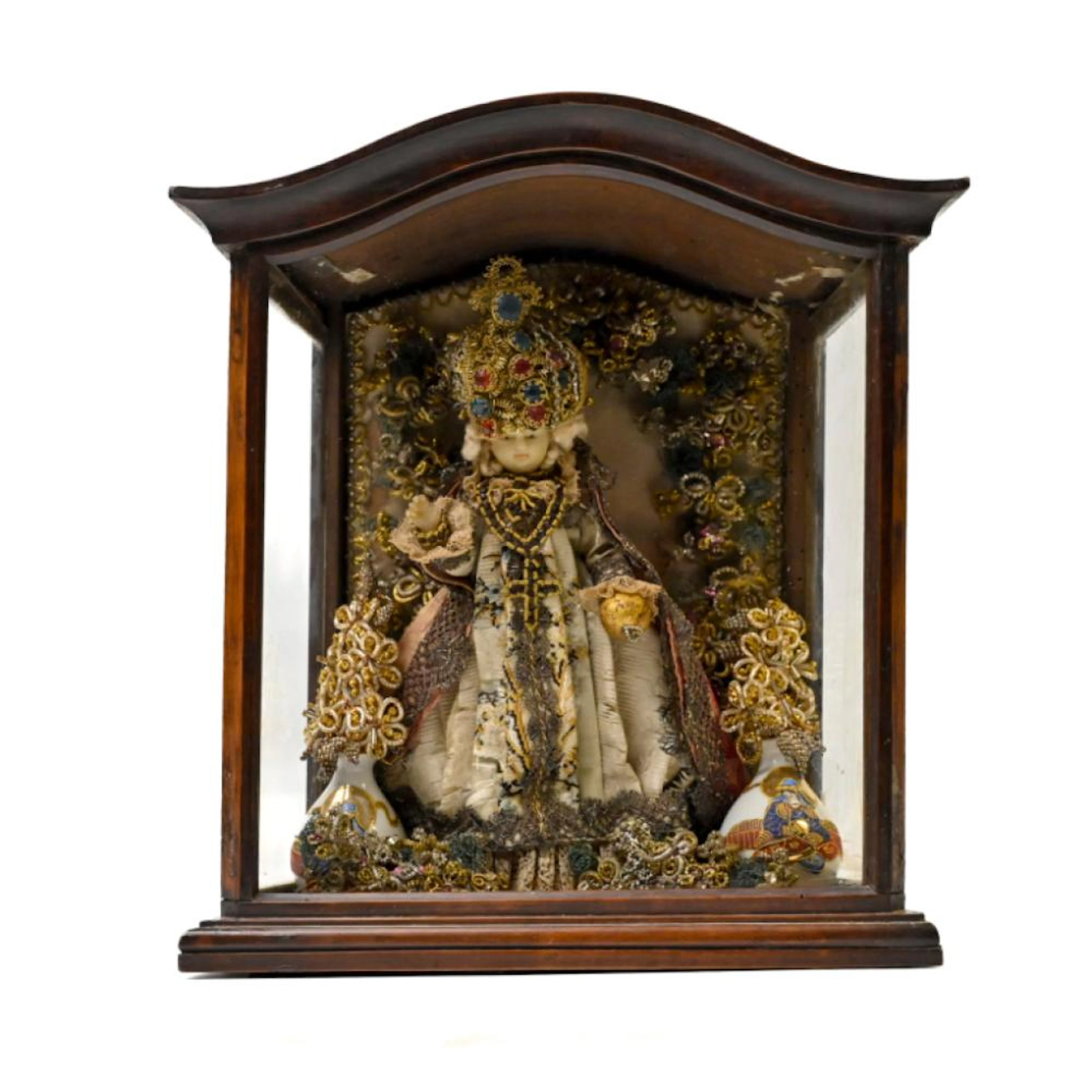 Maquineta com o Menino Jesus de Praga (?) Escultura em cera do século XVIII-XIX.