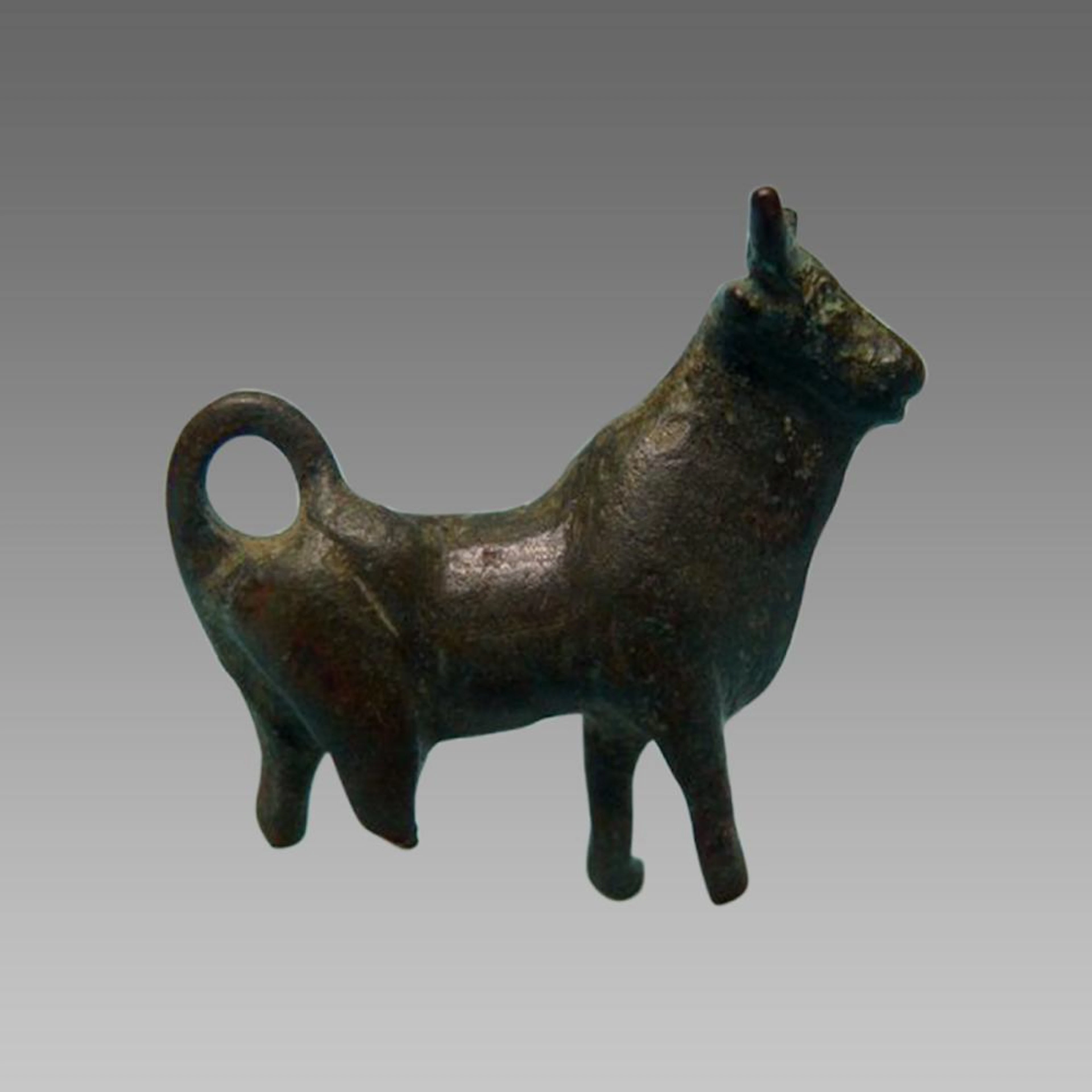 Ancient Iron Age Bronze Miniature Bull, curved tail ca 800 BCE.