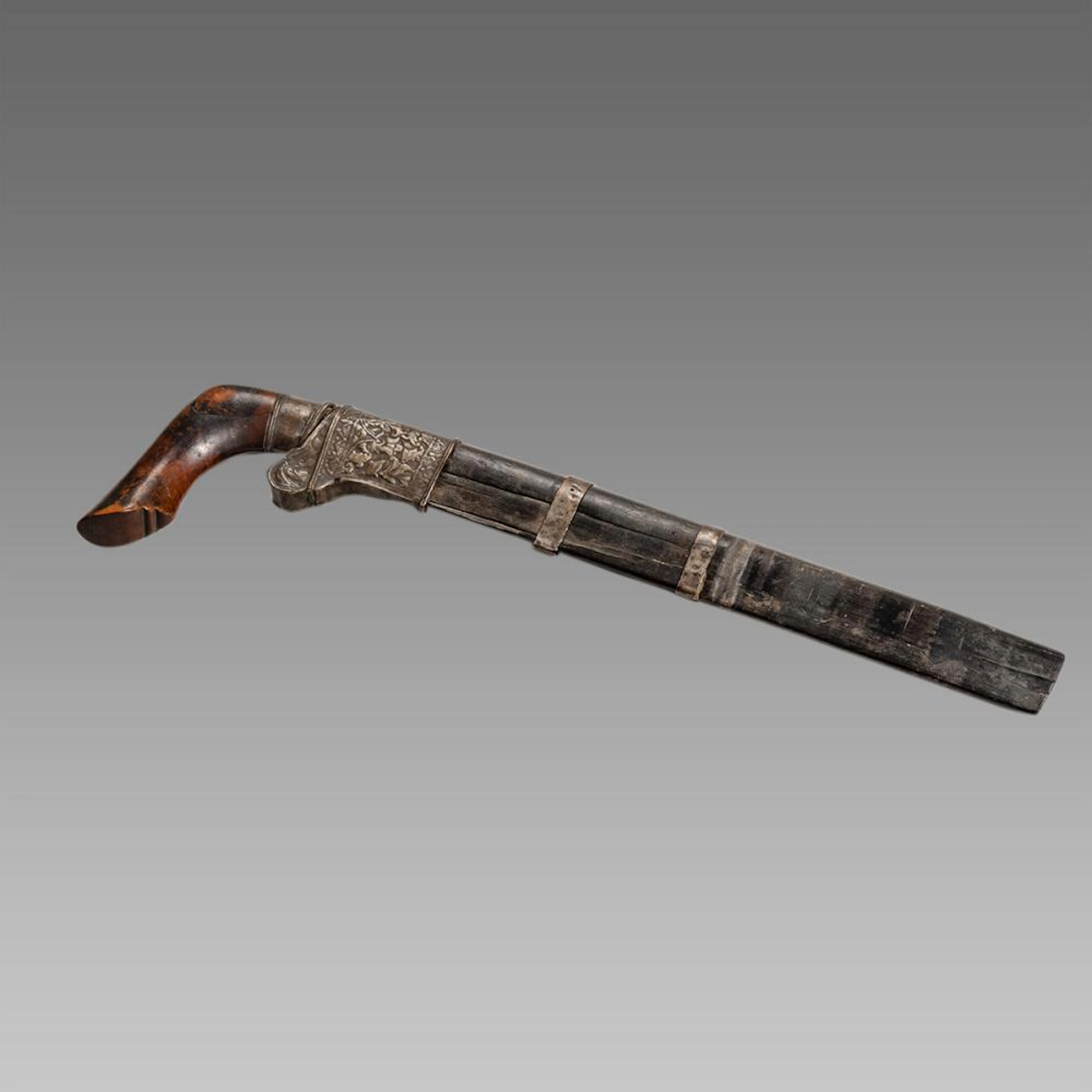 Antique indonesian Dagger with silver mount.