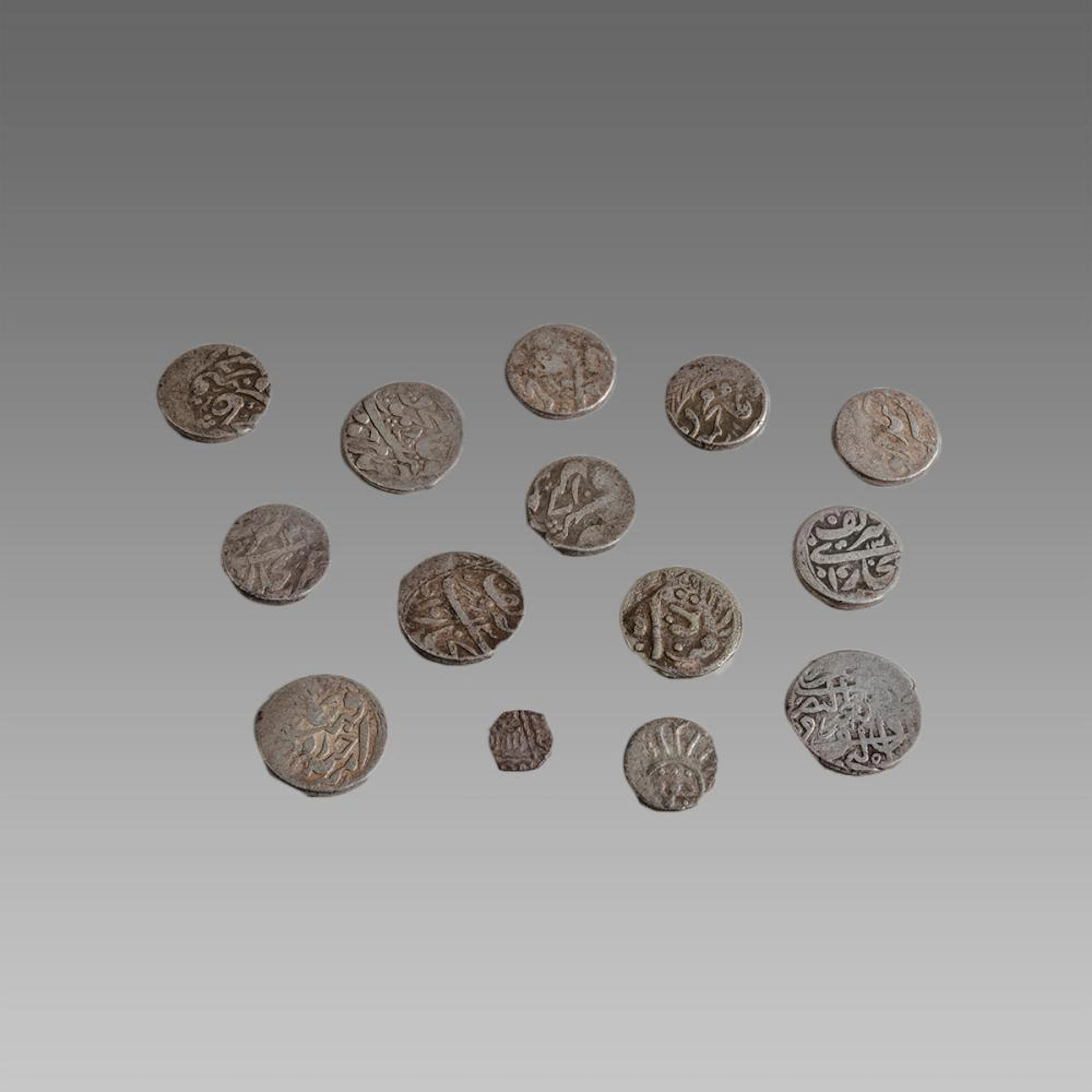 Lot of 14 Islamic India Silver coins c.18th century AD.