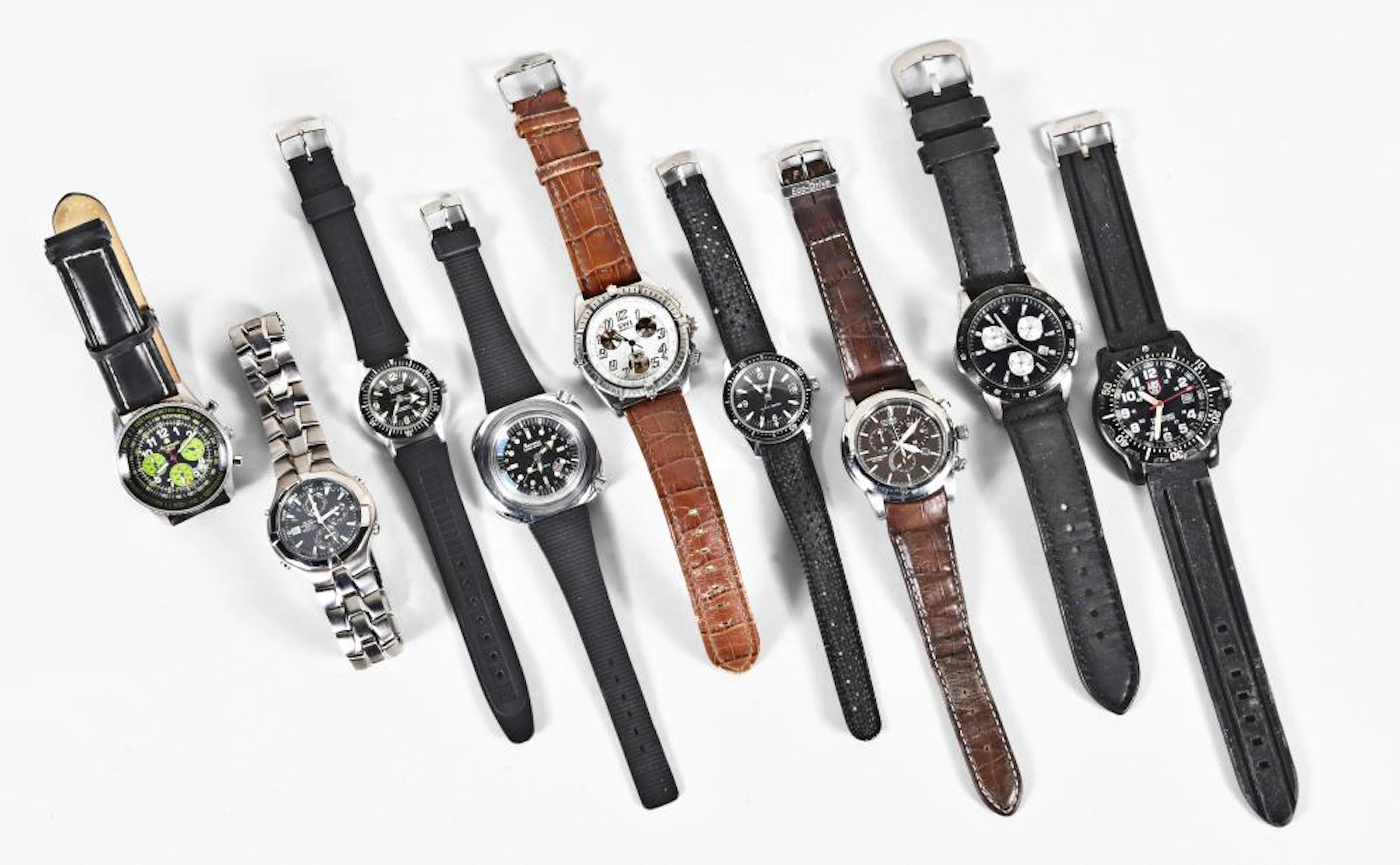 A lot of nine dive and sport watches