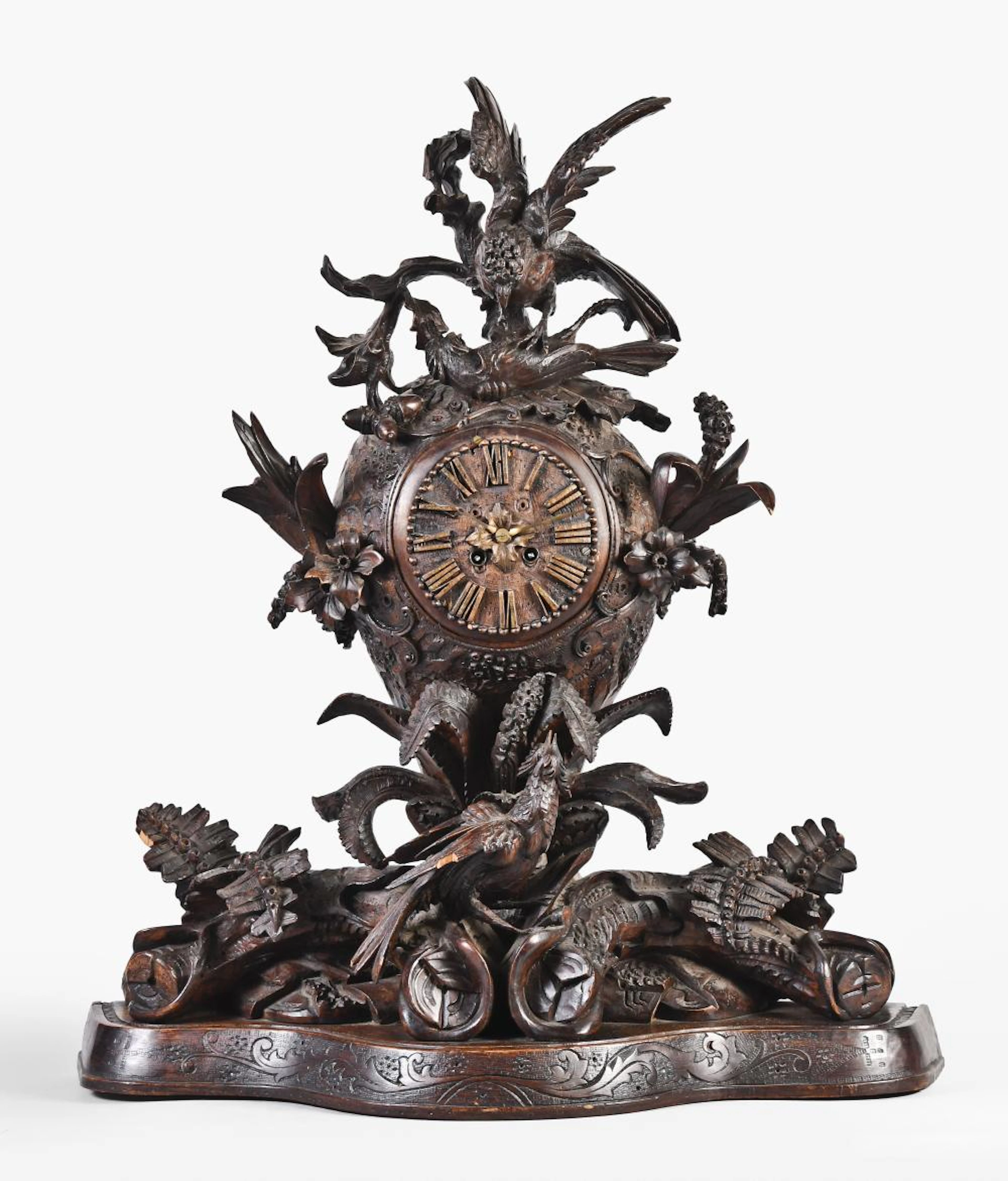 Black Forest carved hardwood shelf clock with bird of prey