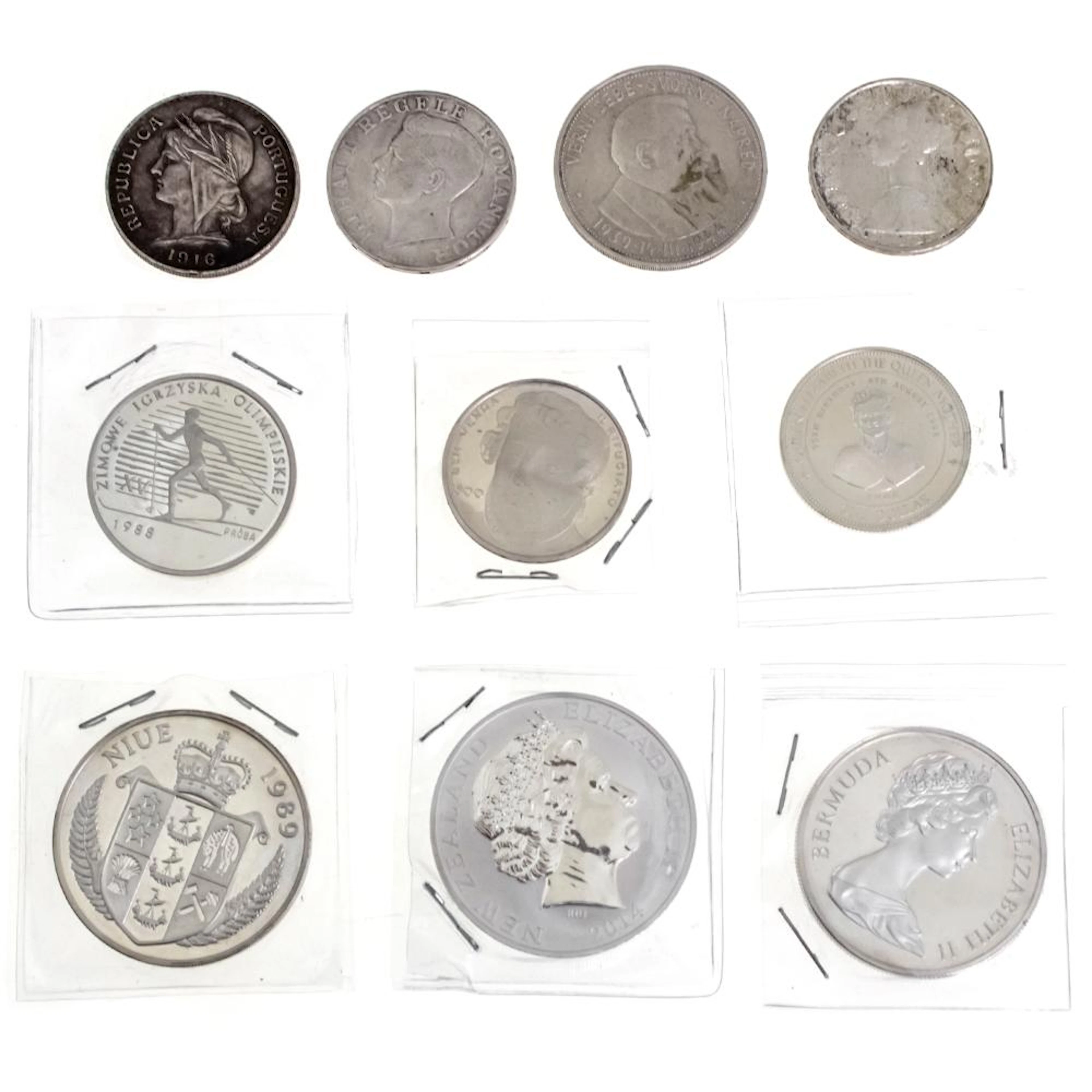 TEN SILVER COINS.