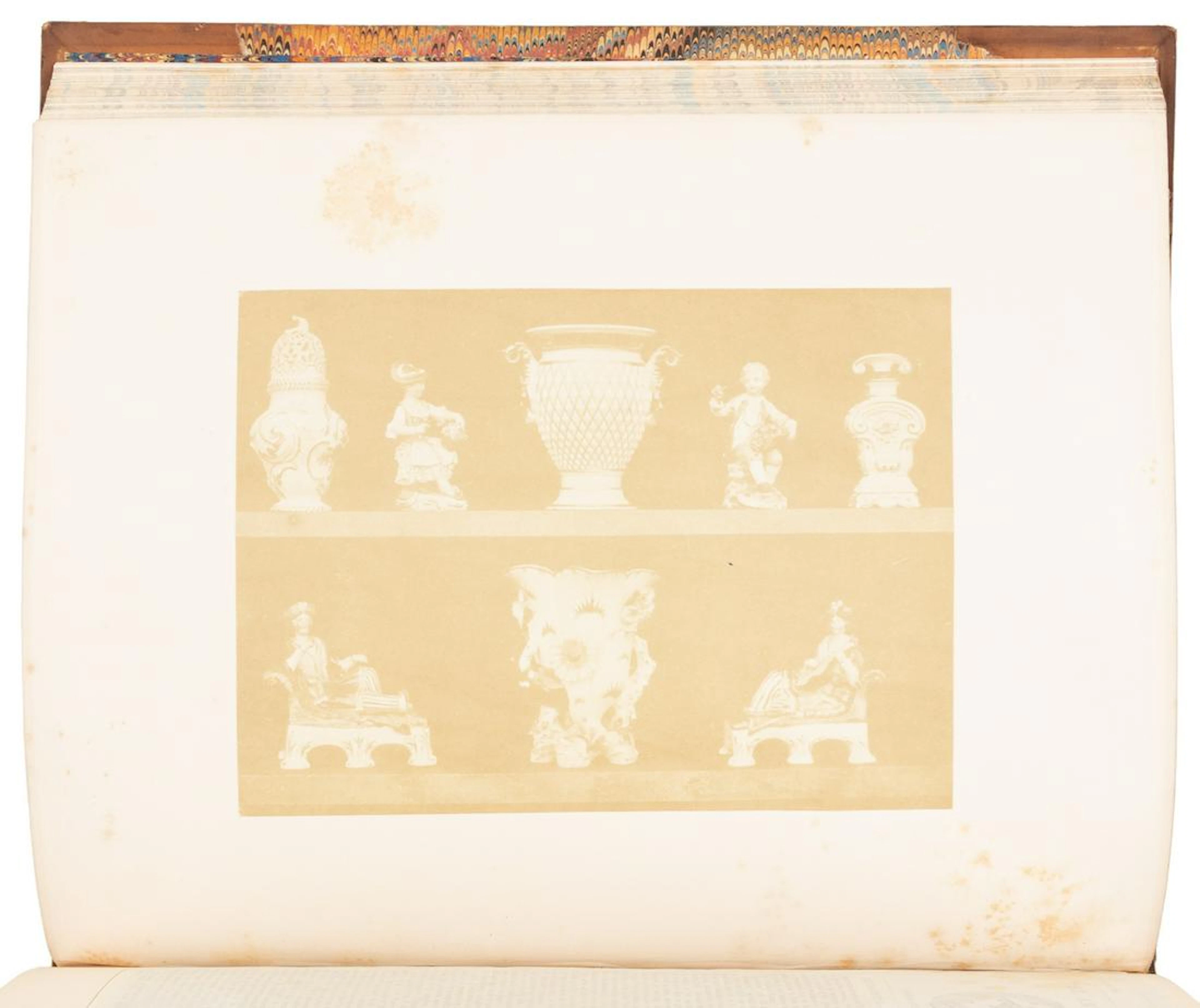 With very early Fox Talbot photograph
