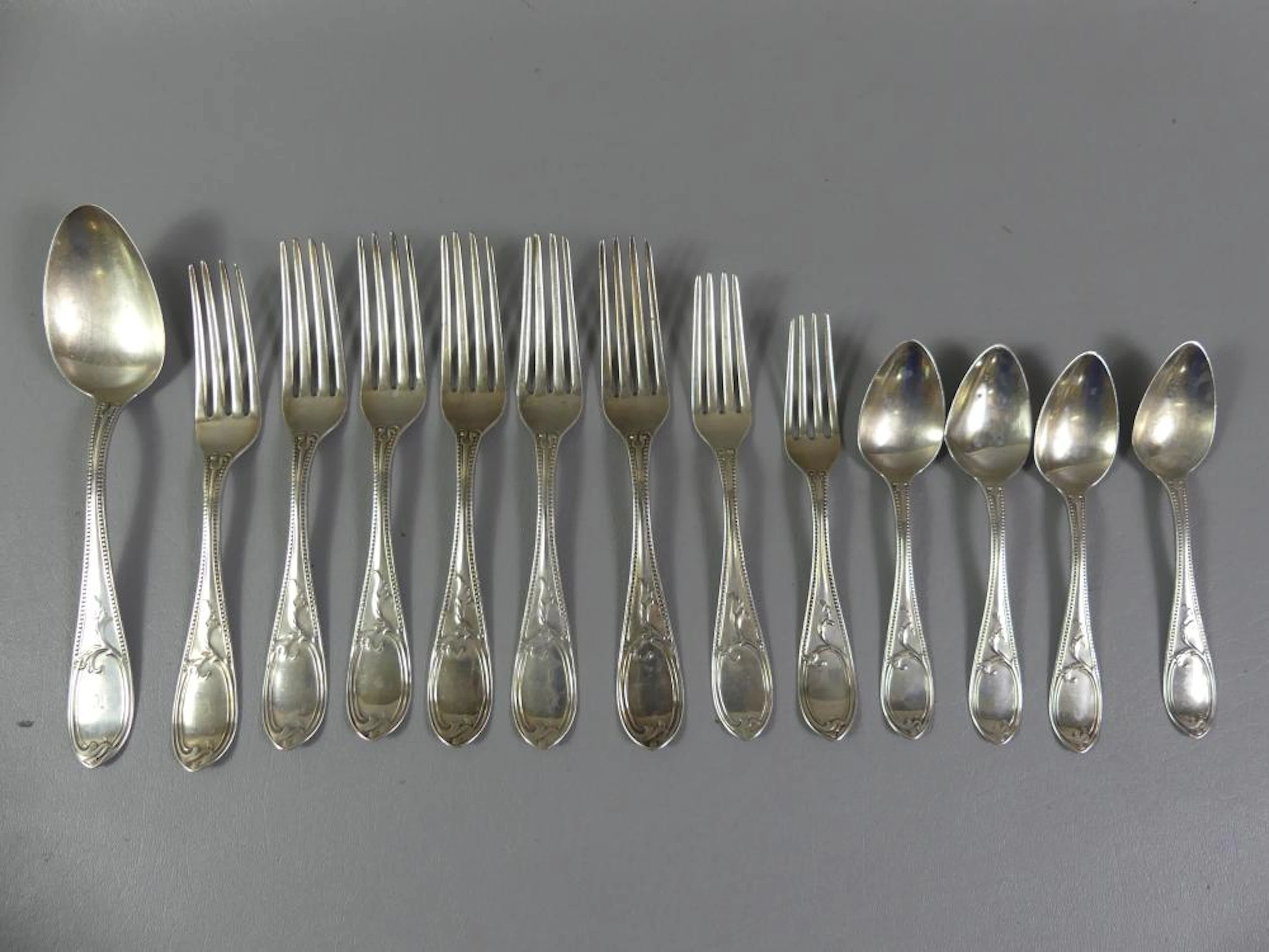 13 PIECES MATCHING STERLING FLATWARE