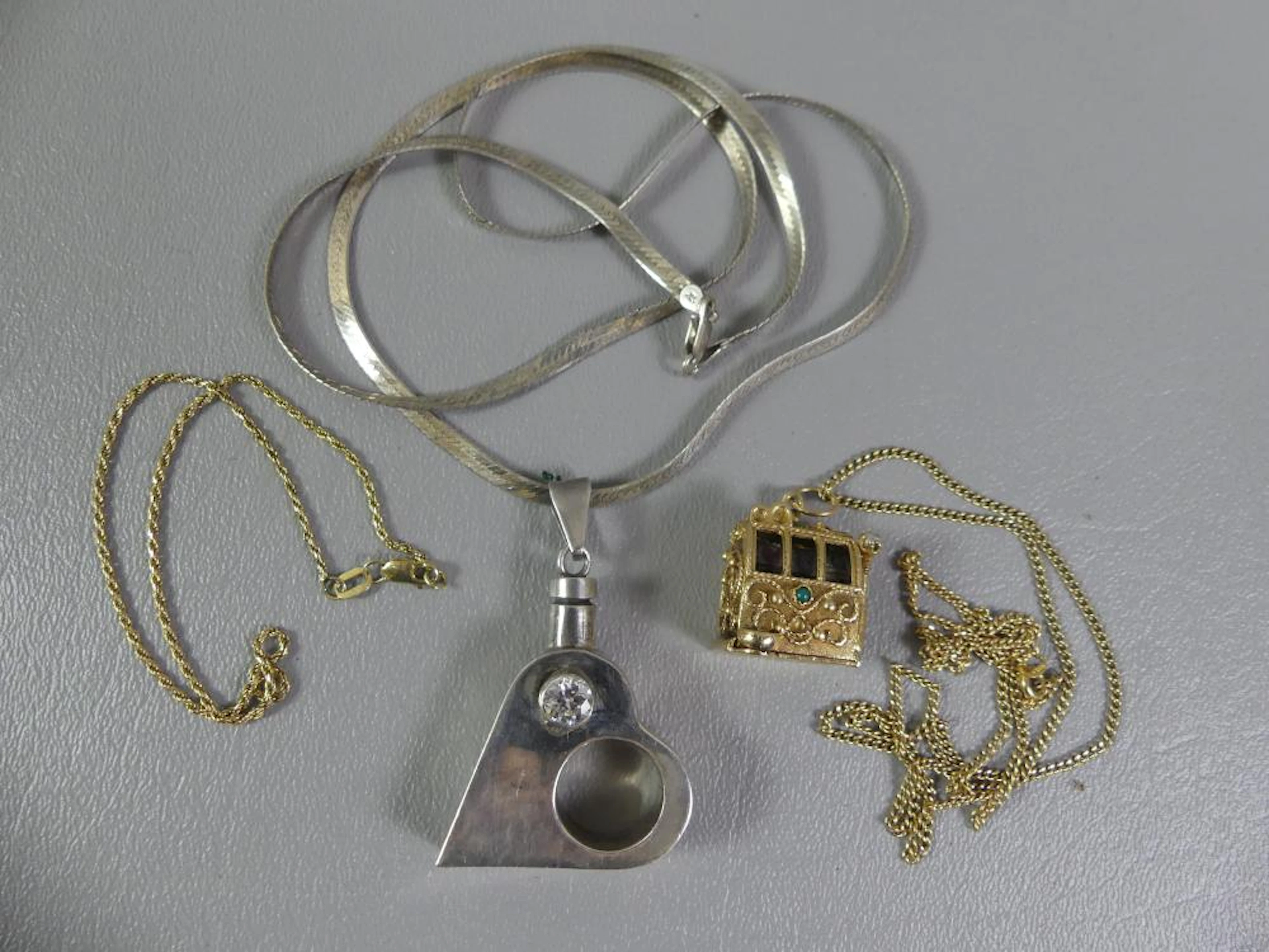 TWO 14K GOLD & 1 SILVER NECKLACES