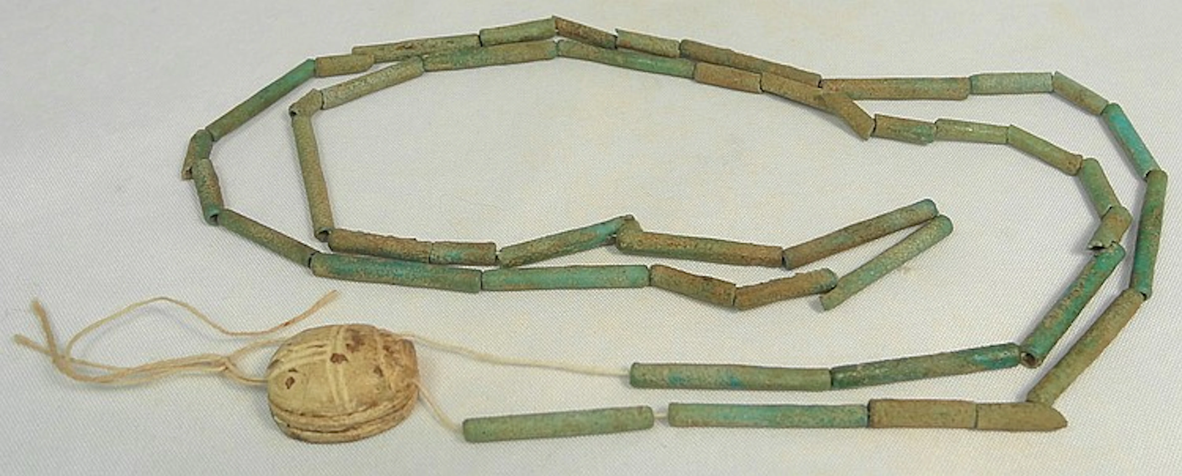 An Egyptian faince tube bead necklace