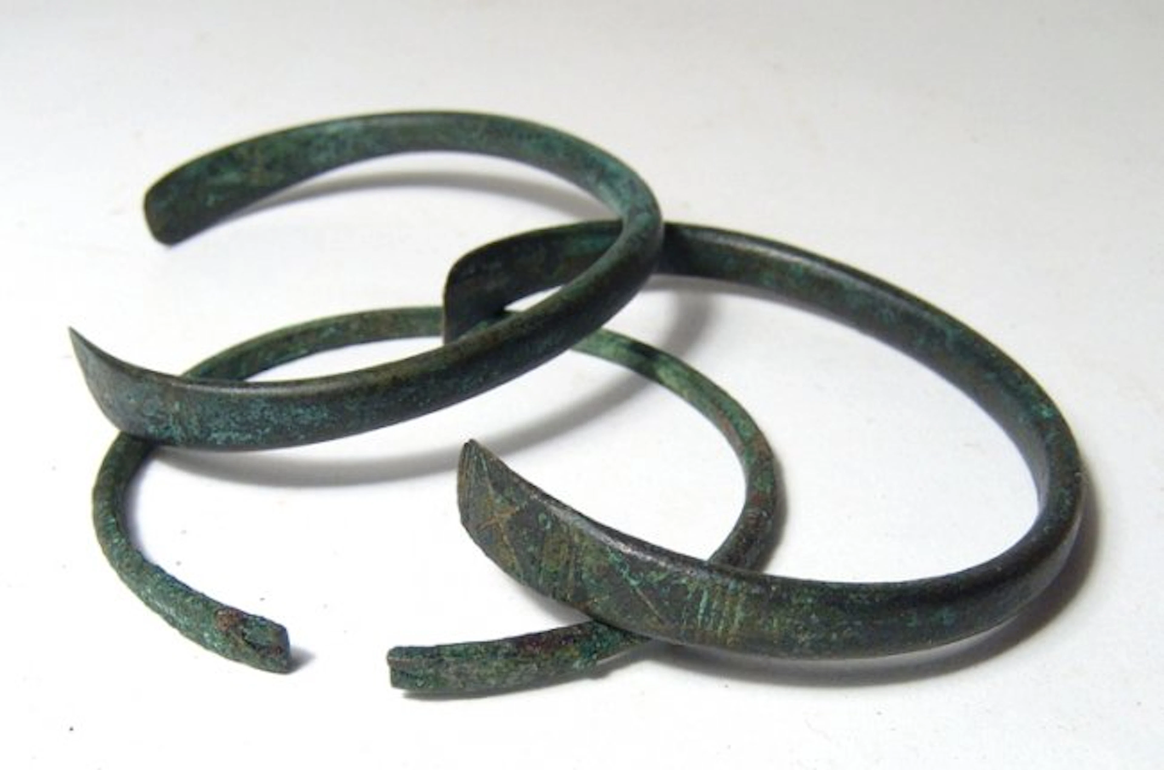 A group of 3 Near Eastern bronze bracelets