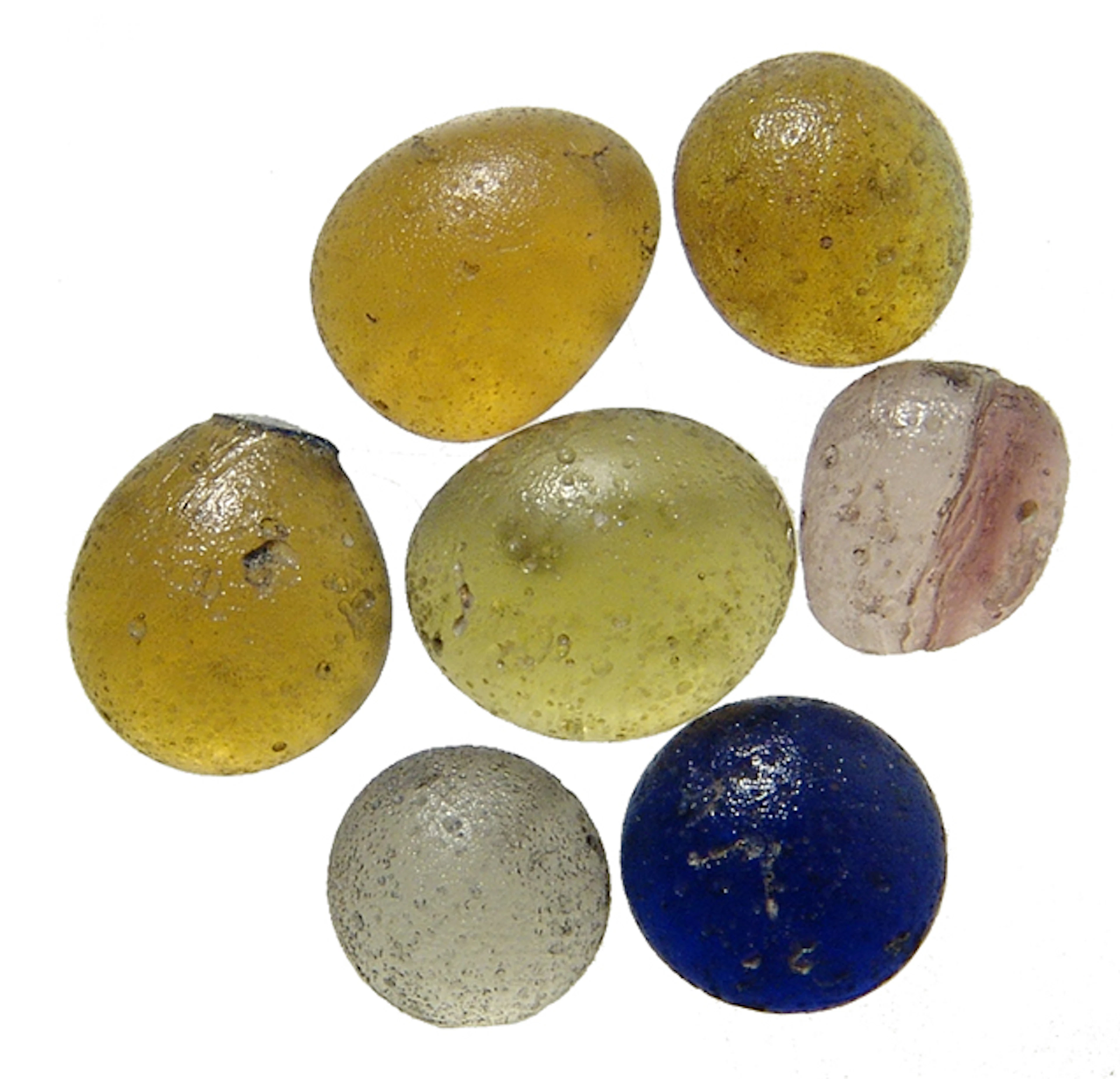 A group of 7 Roman glass gaming counters