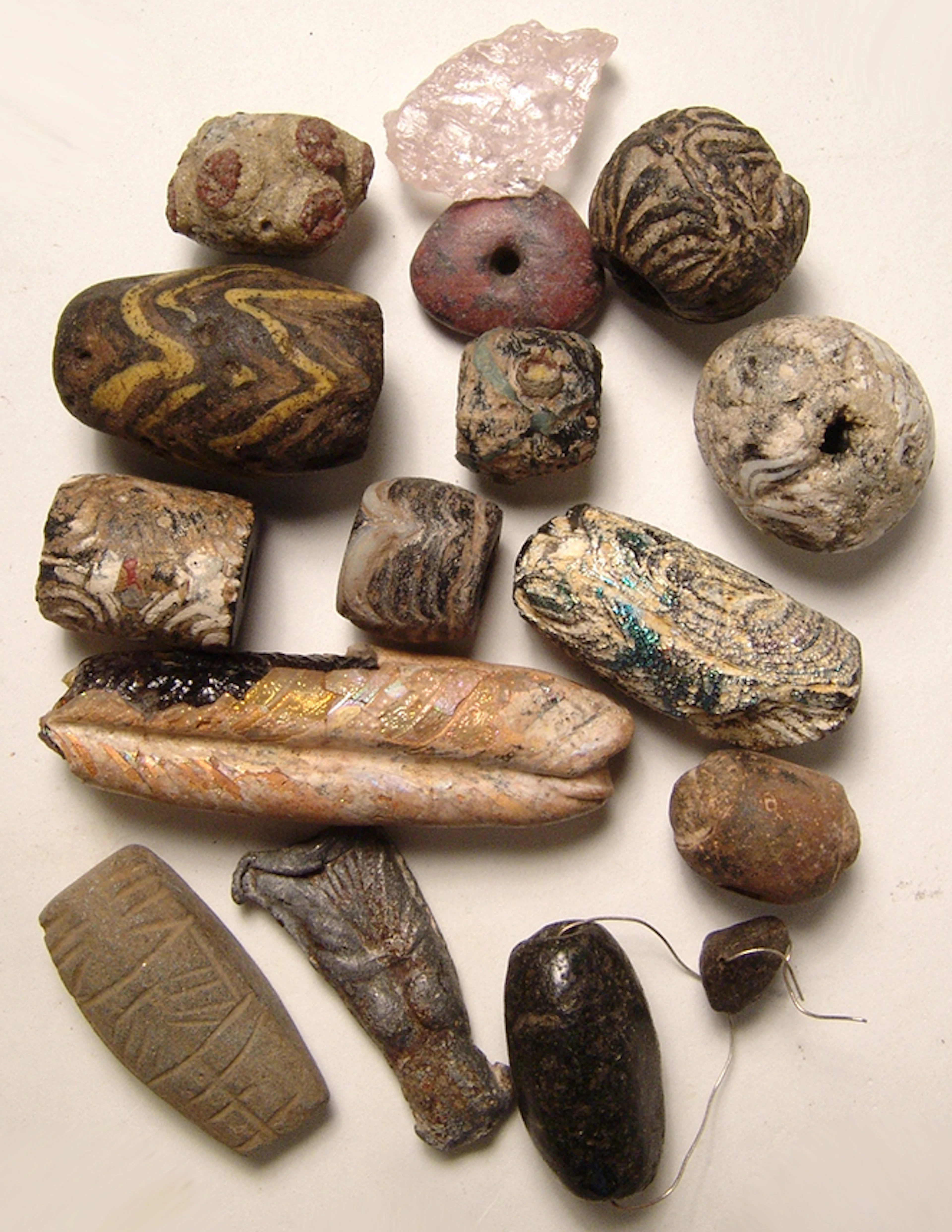 15 ancient beads and small objects from various cultures