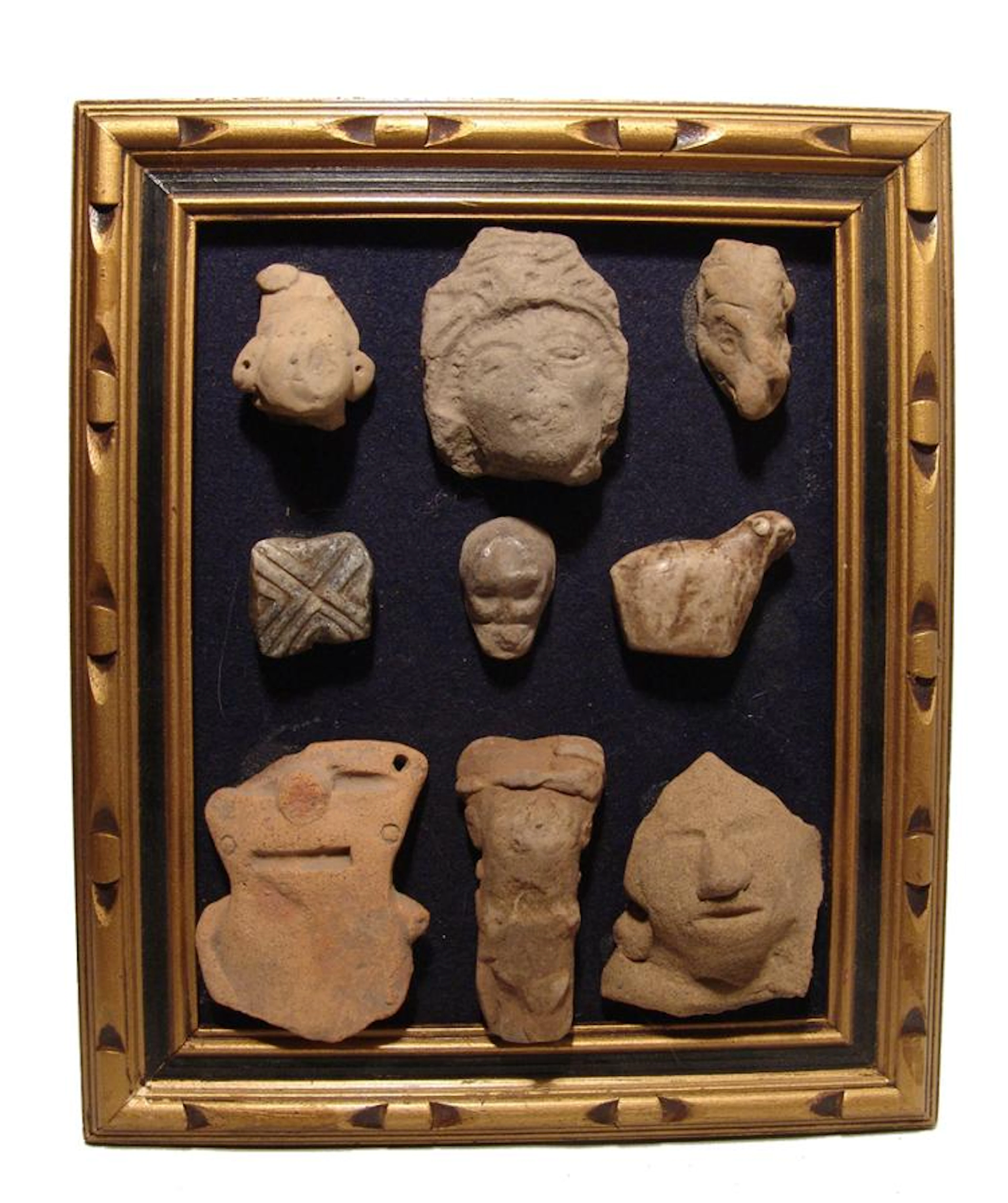 Framed set of Pre-Columbian heads from various cultures