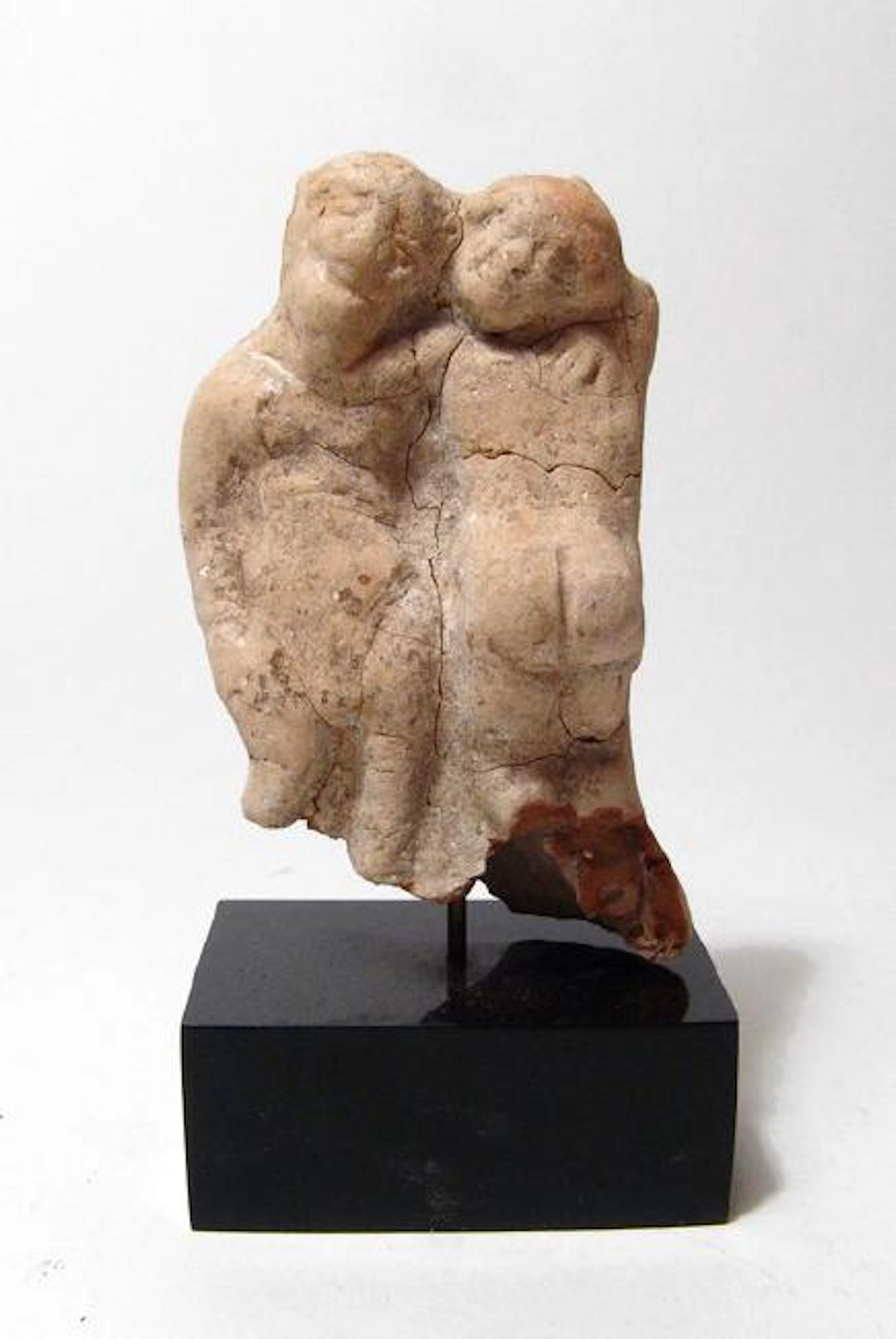 A Greek terracotta erotic scene
