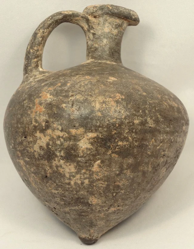 A Greek gray terracotta juglet