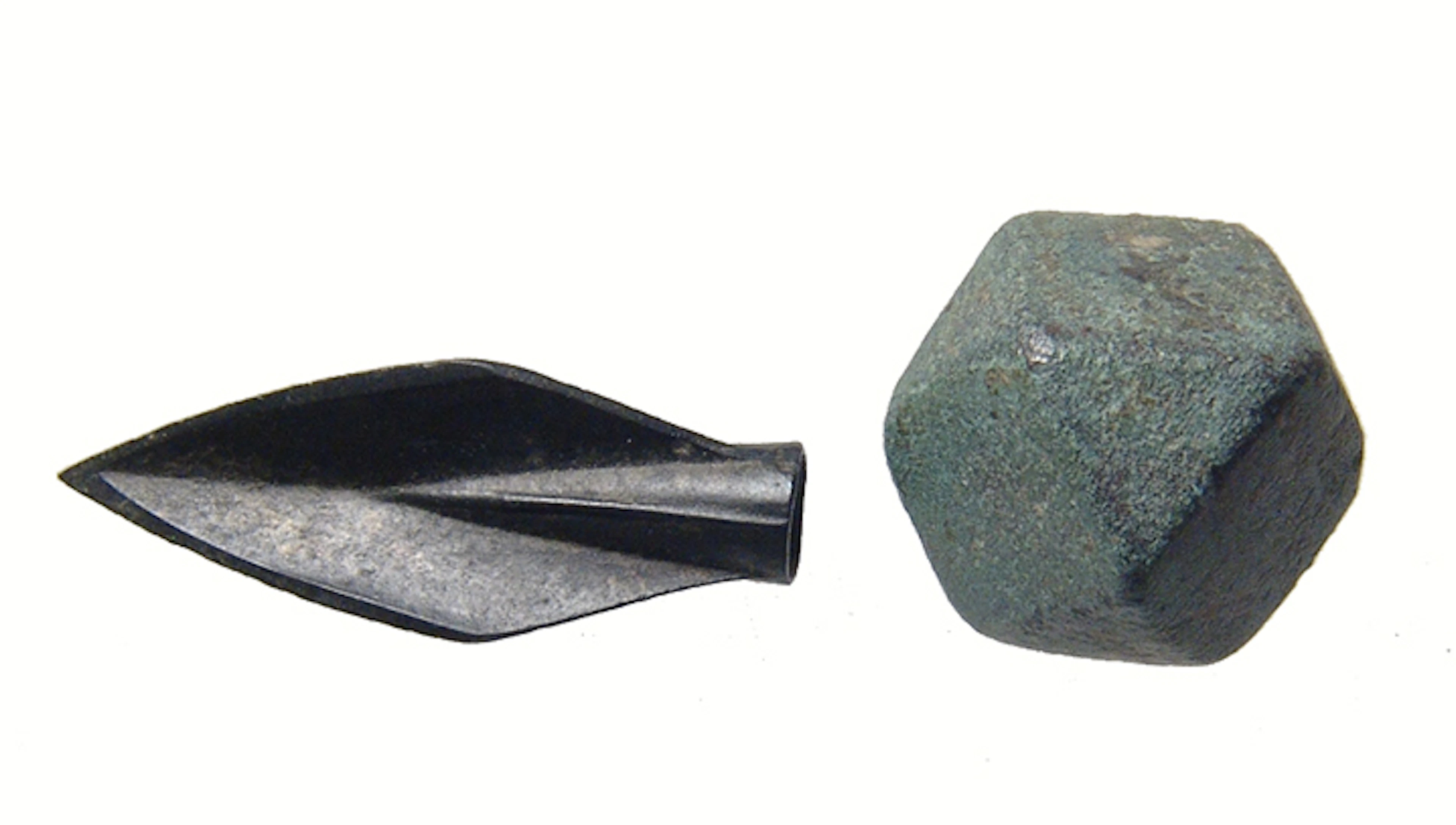 Greek bronze arrowhead and an Islamic weight
