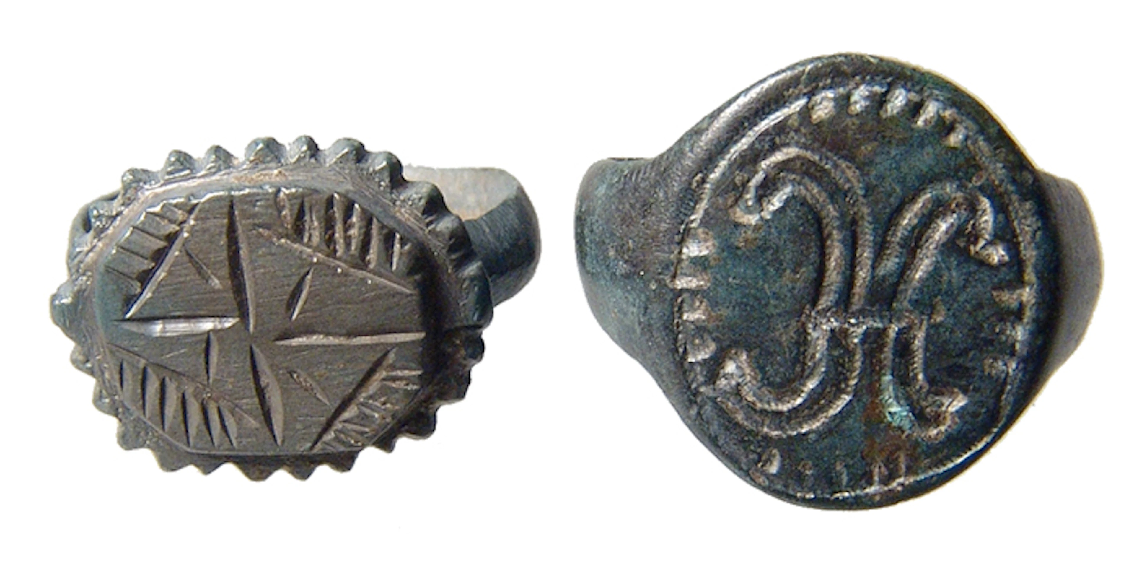 A pair of antique bronze rings