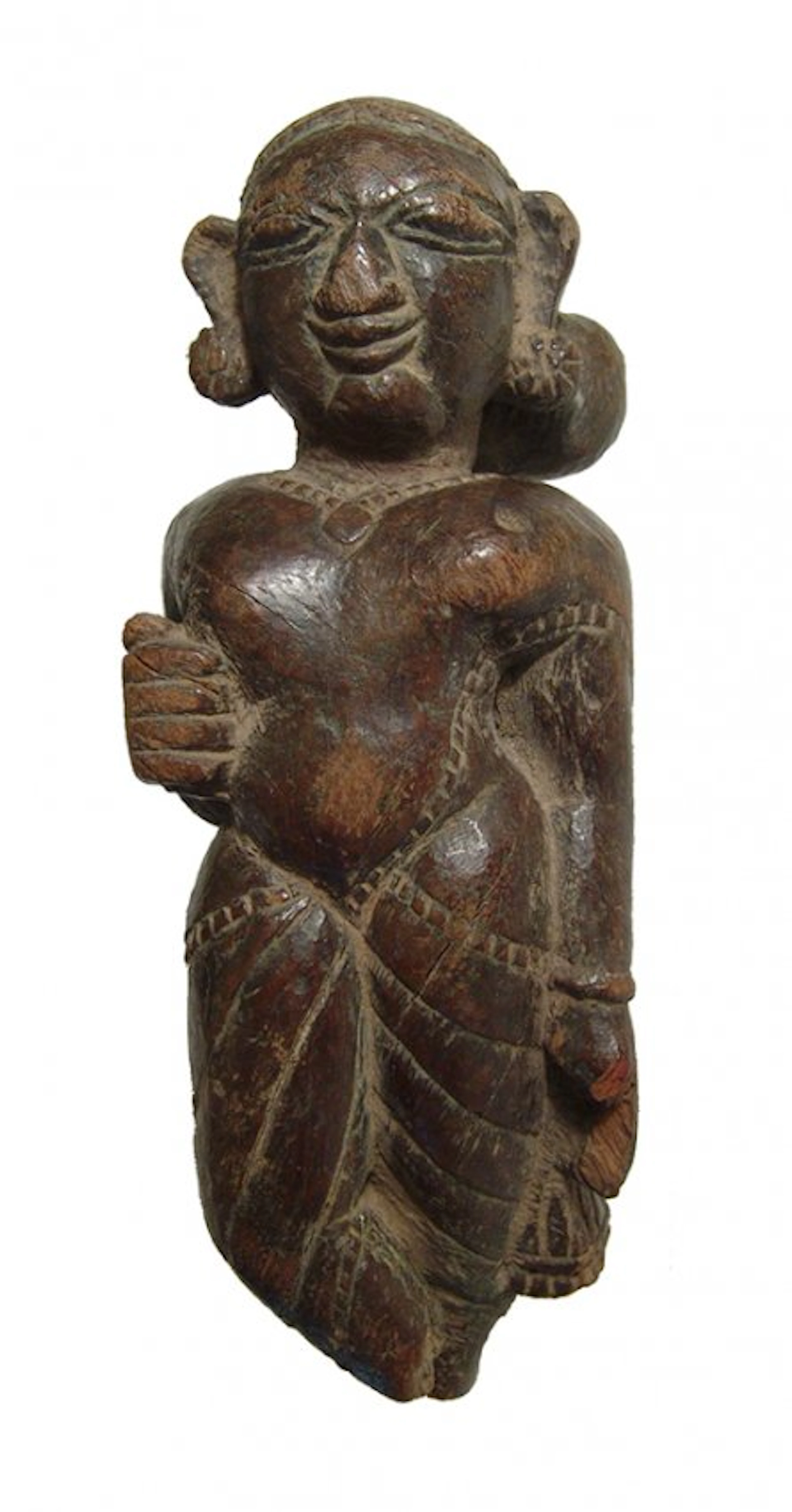 An Indian wood figure of a Yaksha