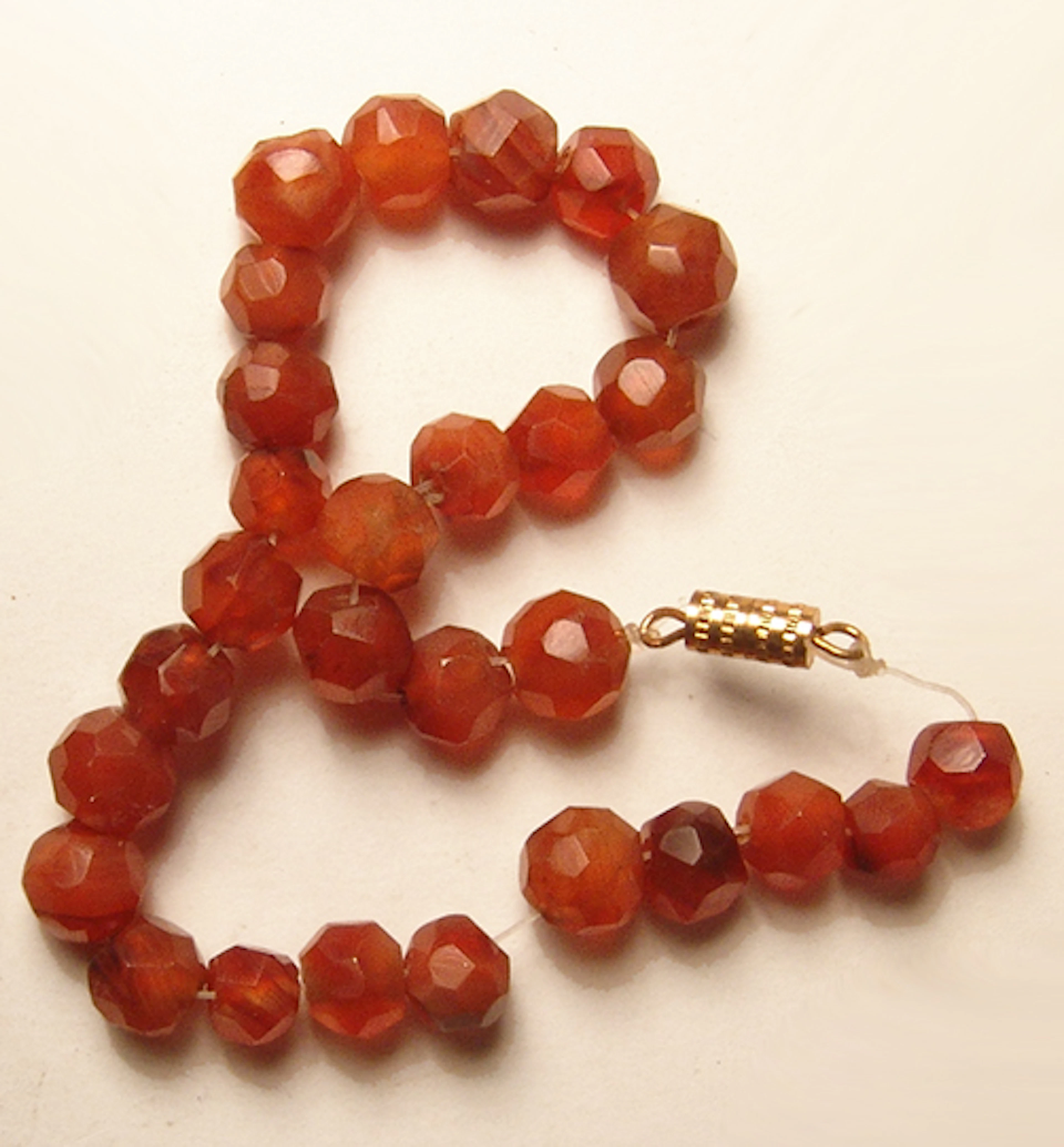 Strand of beautifully faceted Parthian carnelian beads