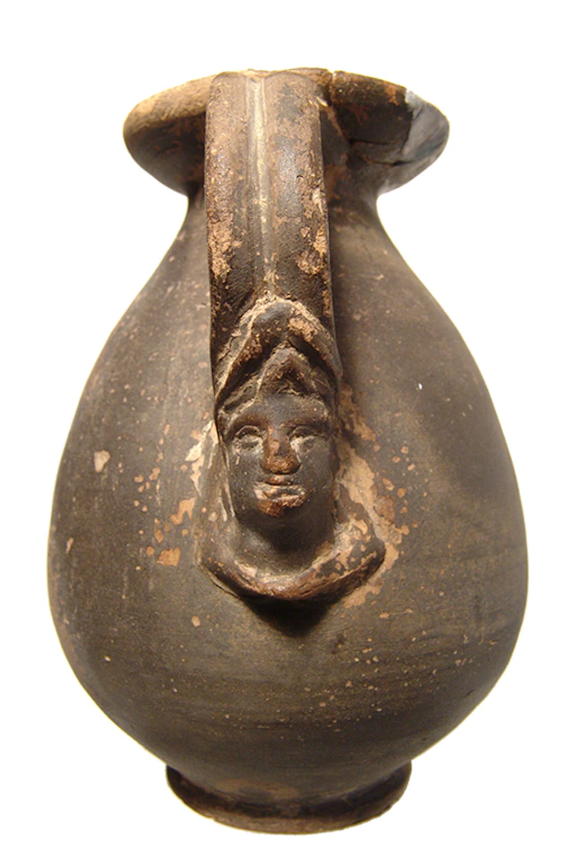 Hellenistic Greek ceramic olpe with female head