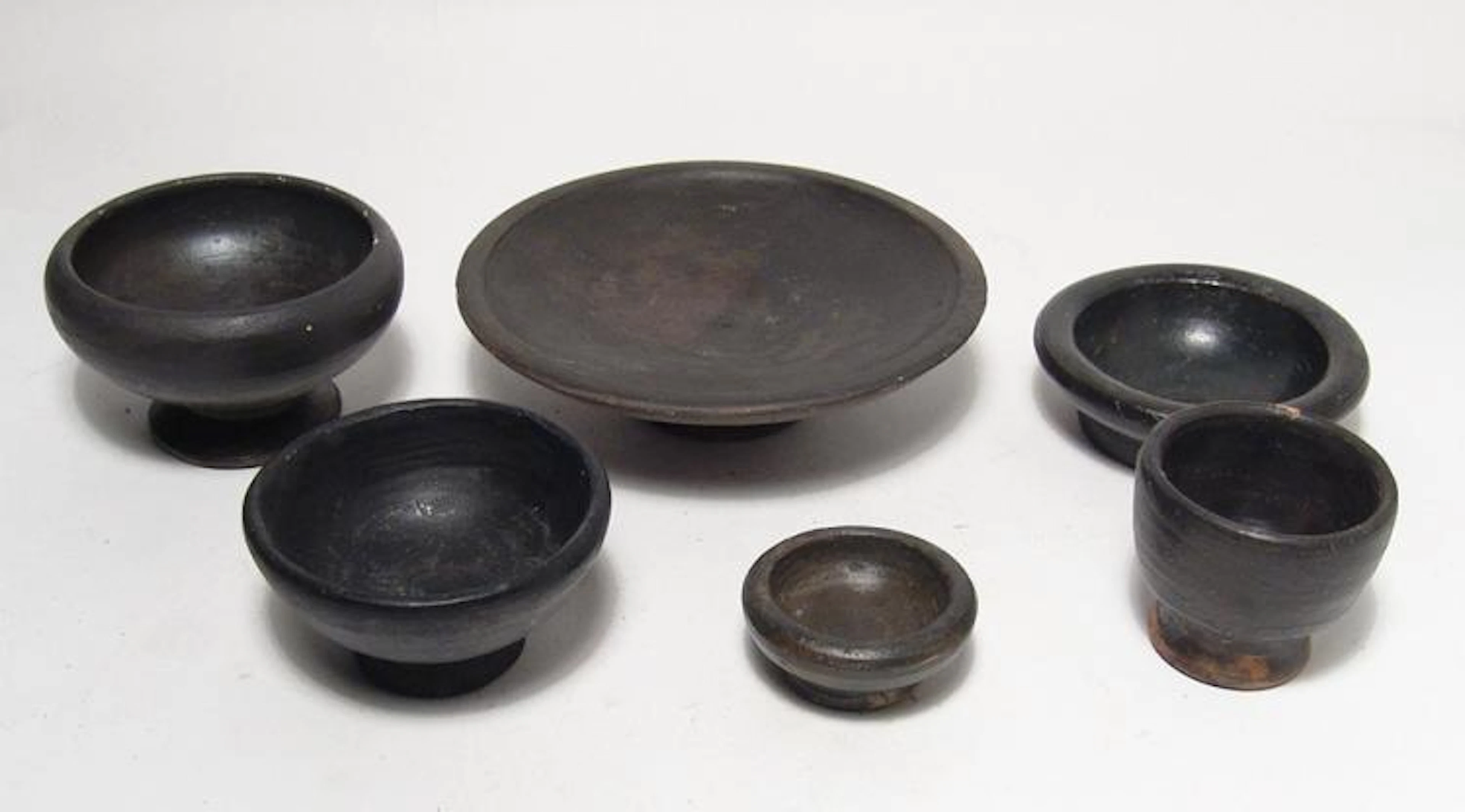 A nice group of 6 Greek black-ware pottery vessels