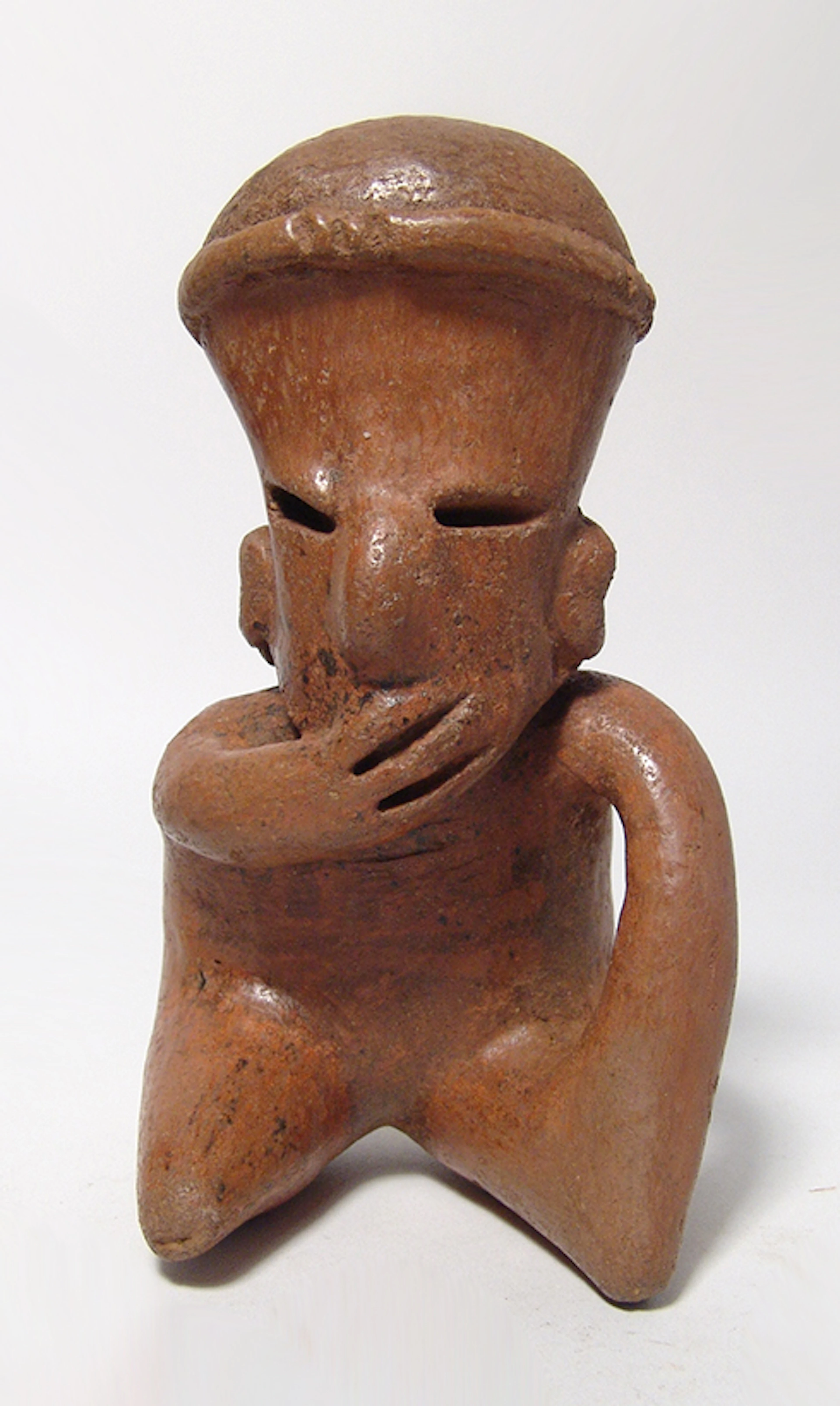 An attractive Nayarit seated figure, West Mexico
