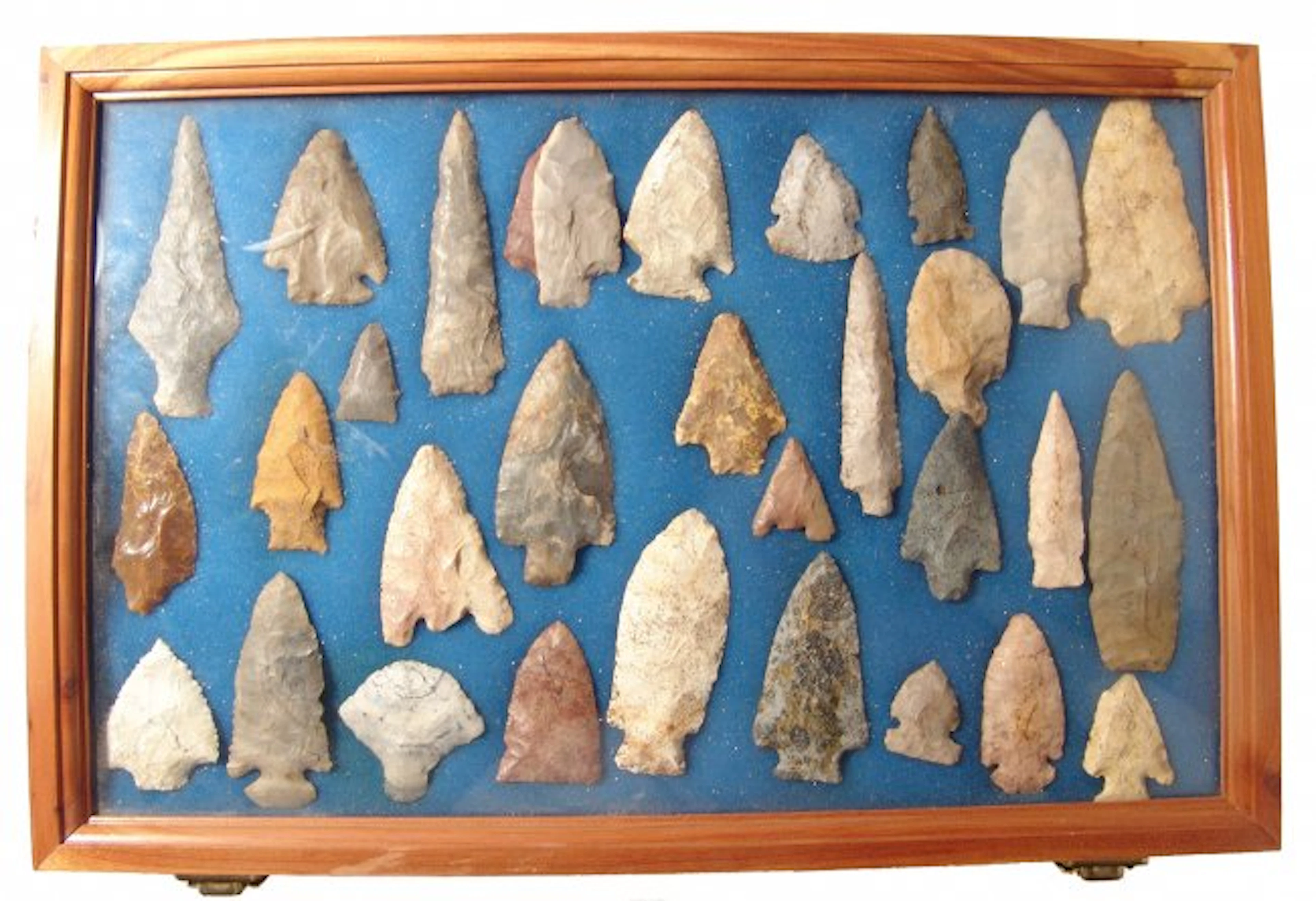 A collection of 30 stone arrow/spear points
