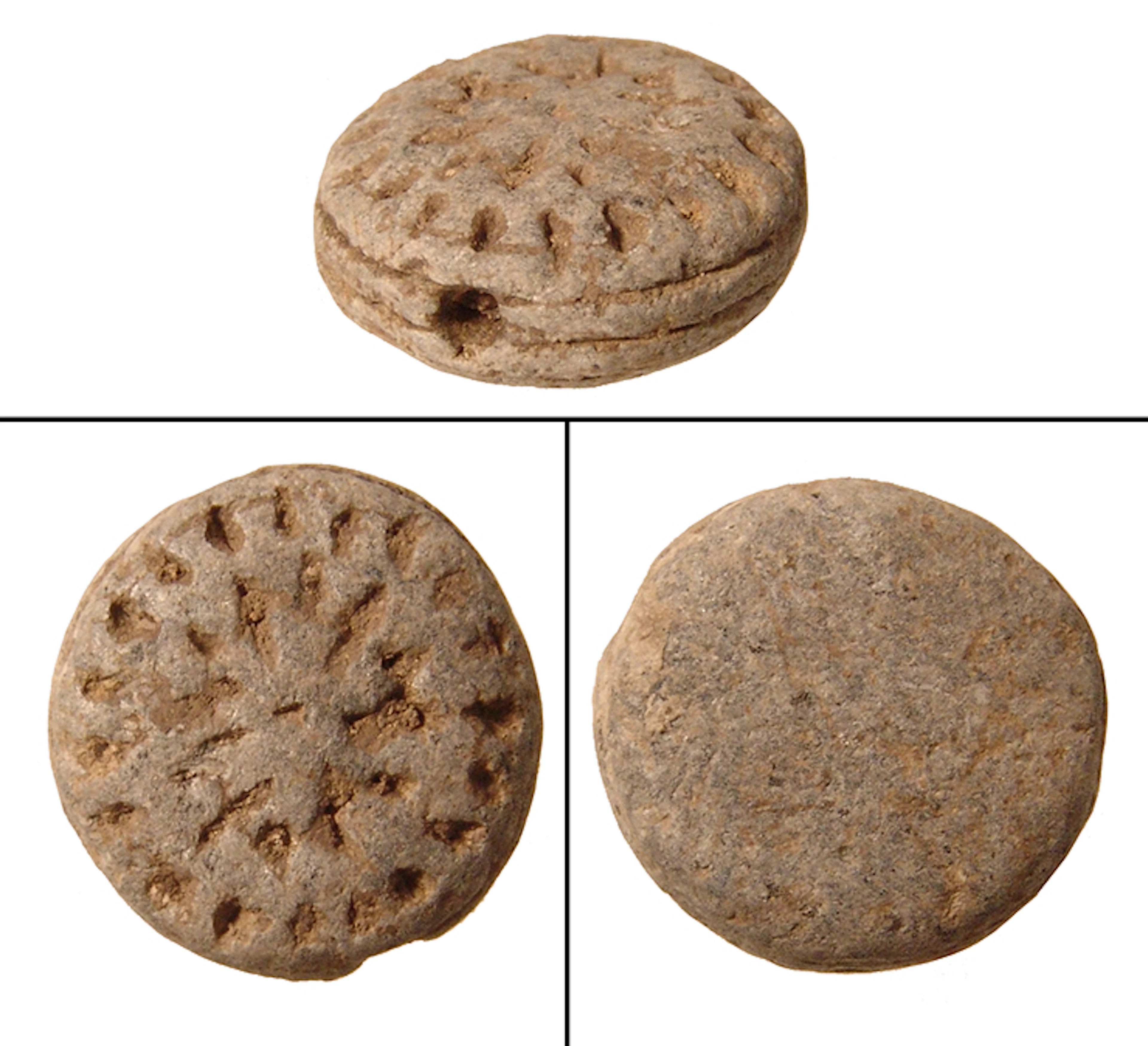 A rare Hittite grey steatite rounded stamp seal