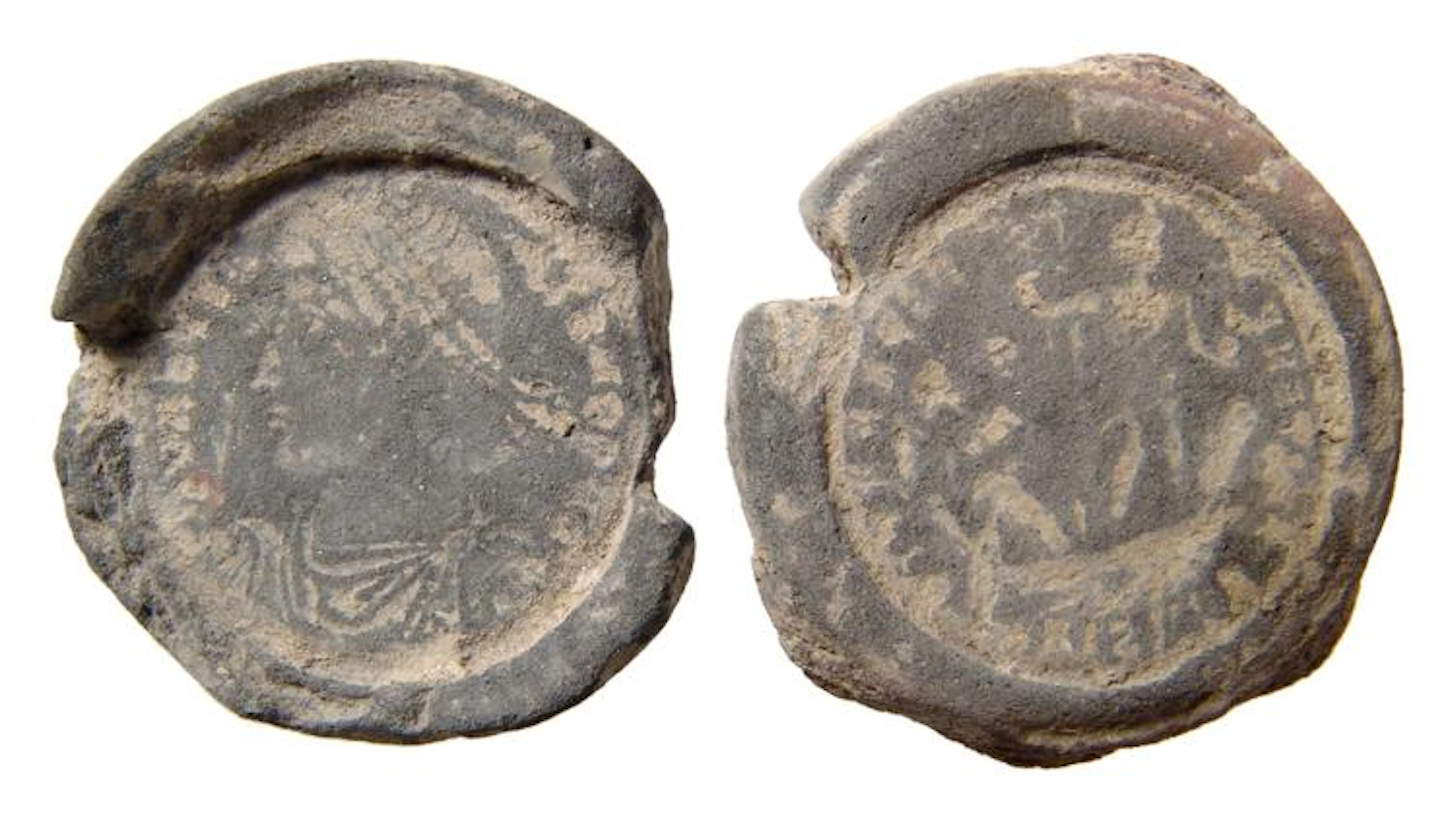 A pair of Roman terracotta counterfeiter/forger?s mould