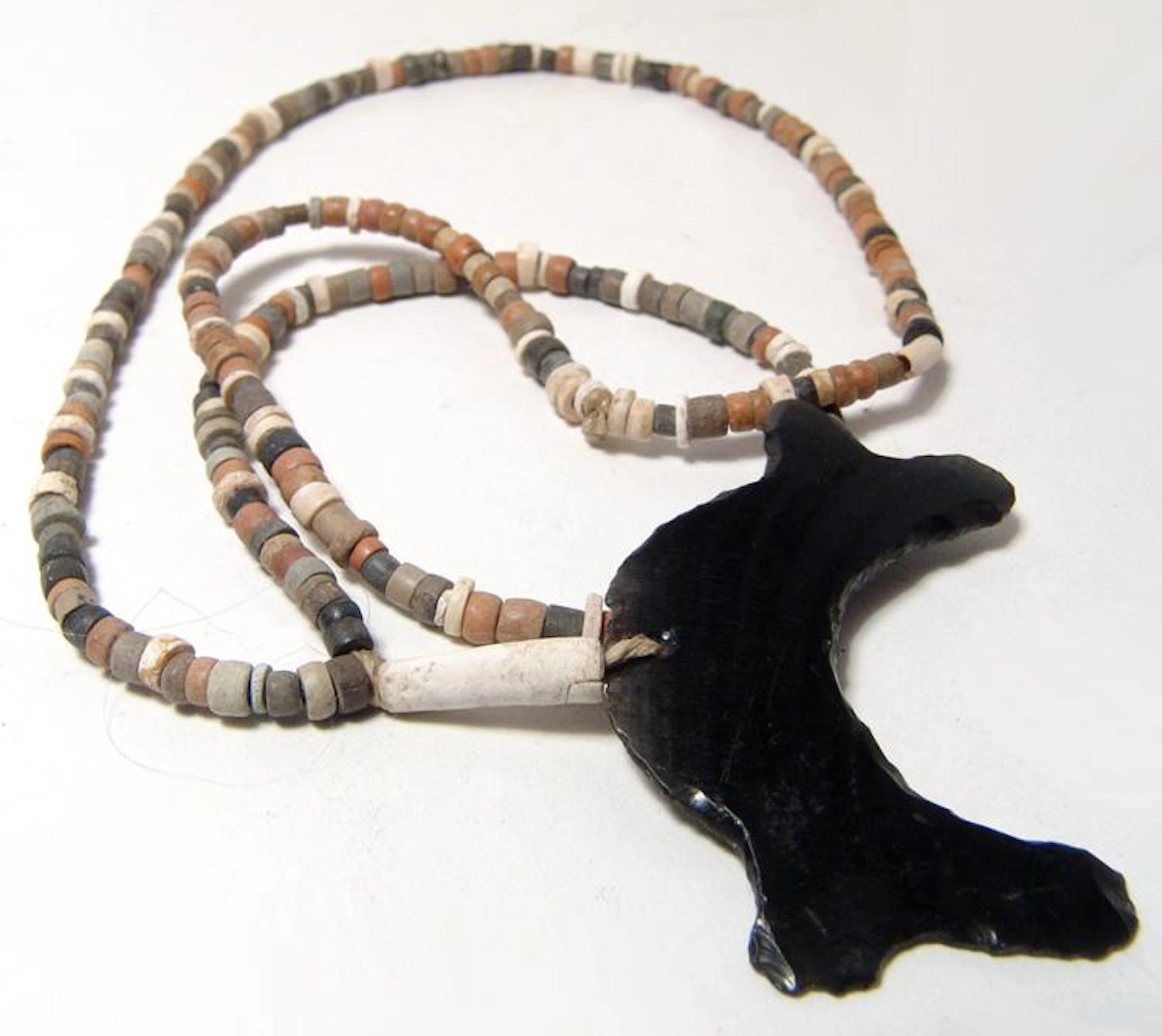 Necklace of Chimu steatite beads with obsidian pendant